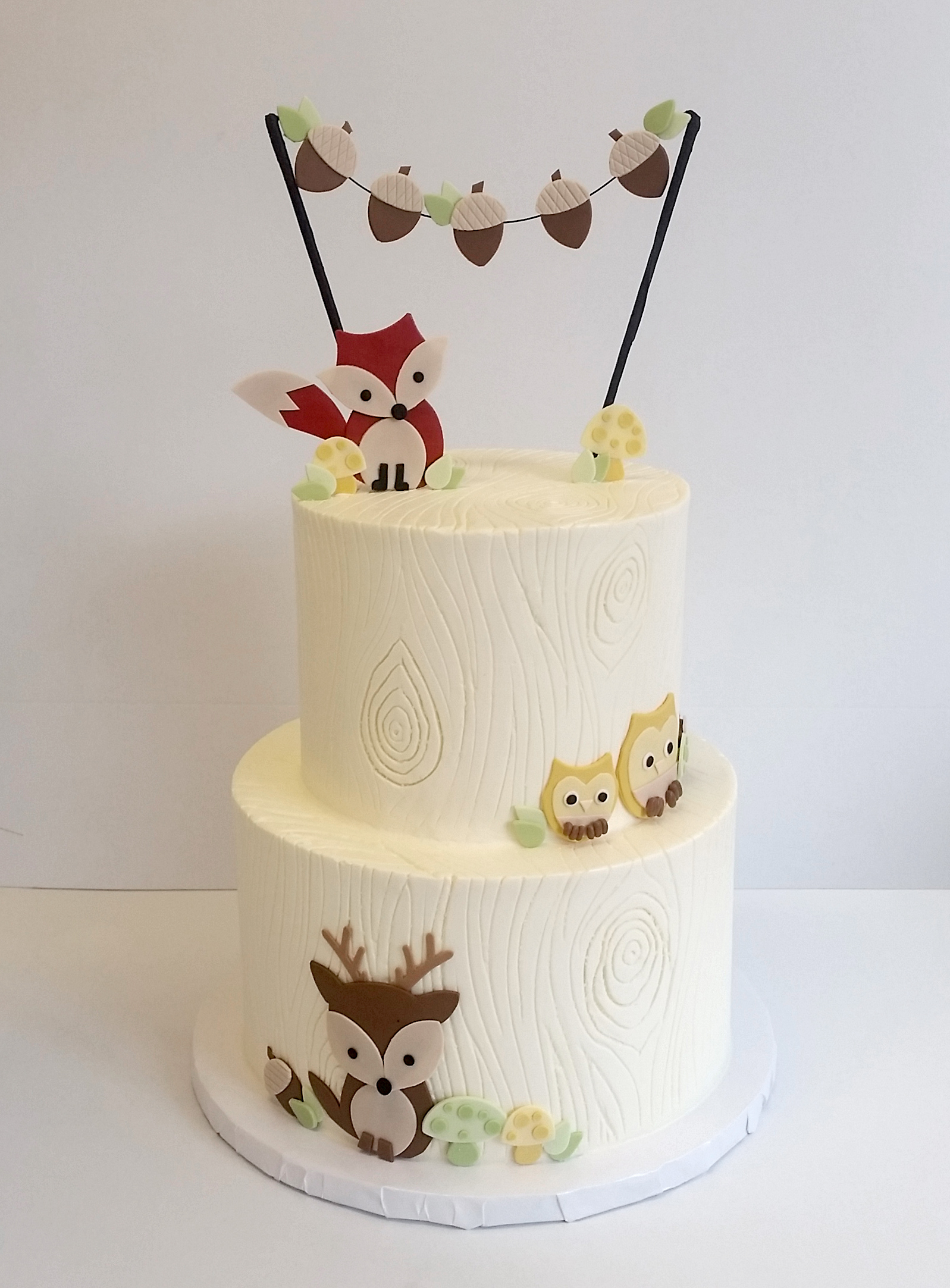 buttercream woodgrain animals tiered.jpg