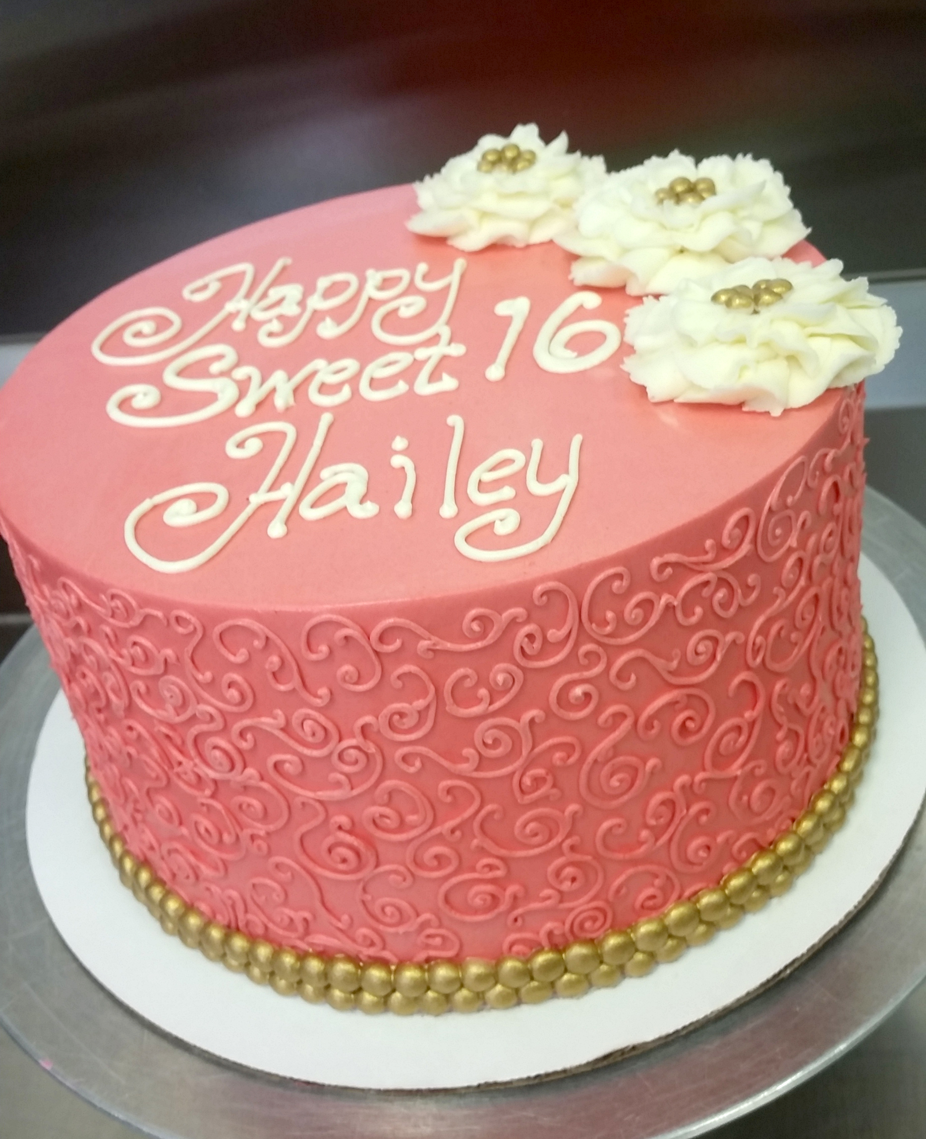 colored scrollwork gold accent cake.jpg