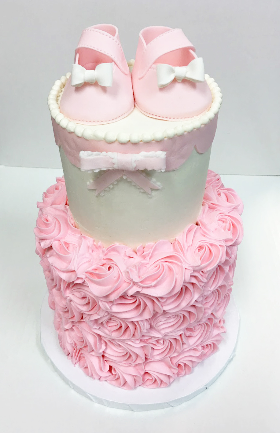 two tier rosette baby bootie cake.jpg