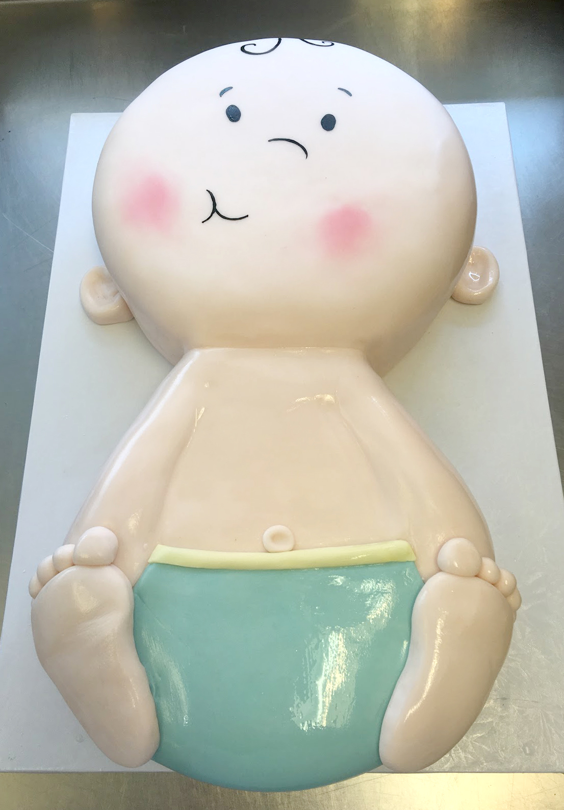 sculpted baby cake.jpg