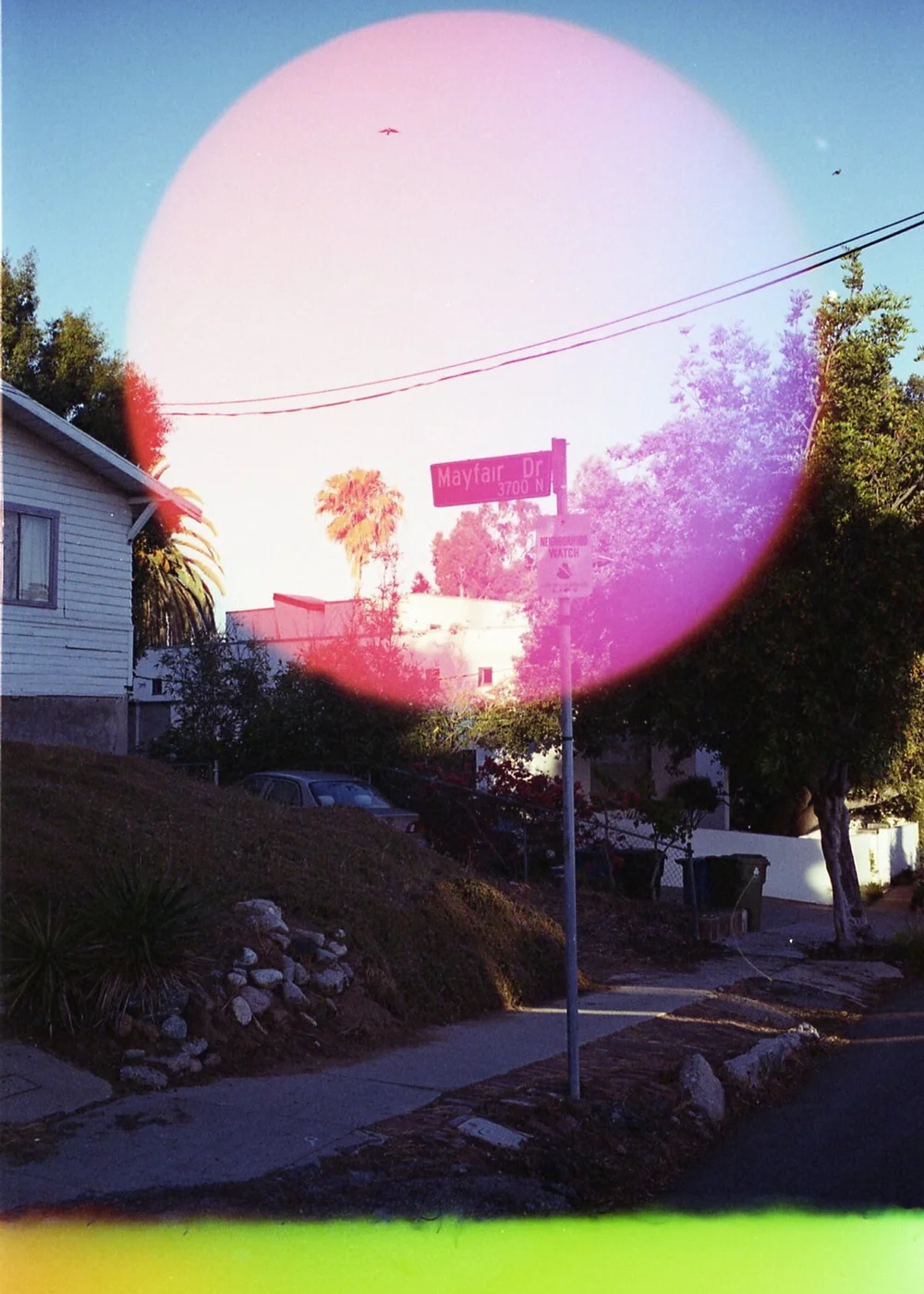 Psych Blues #6, experimental 35mm film image of a street sign