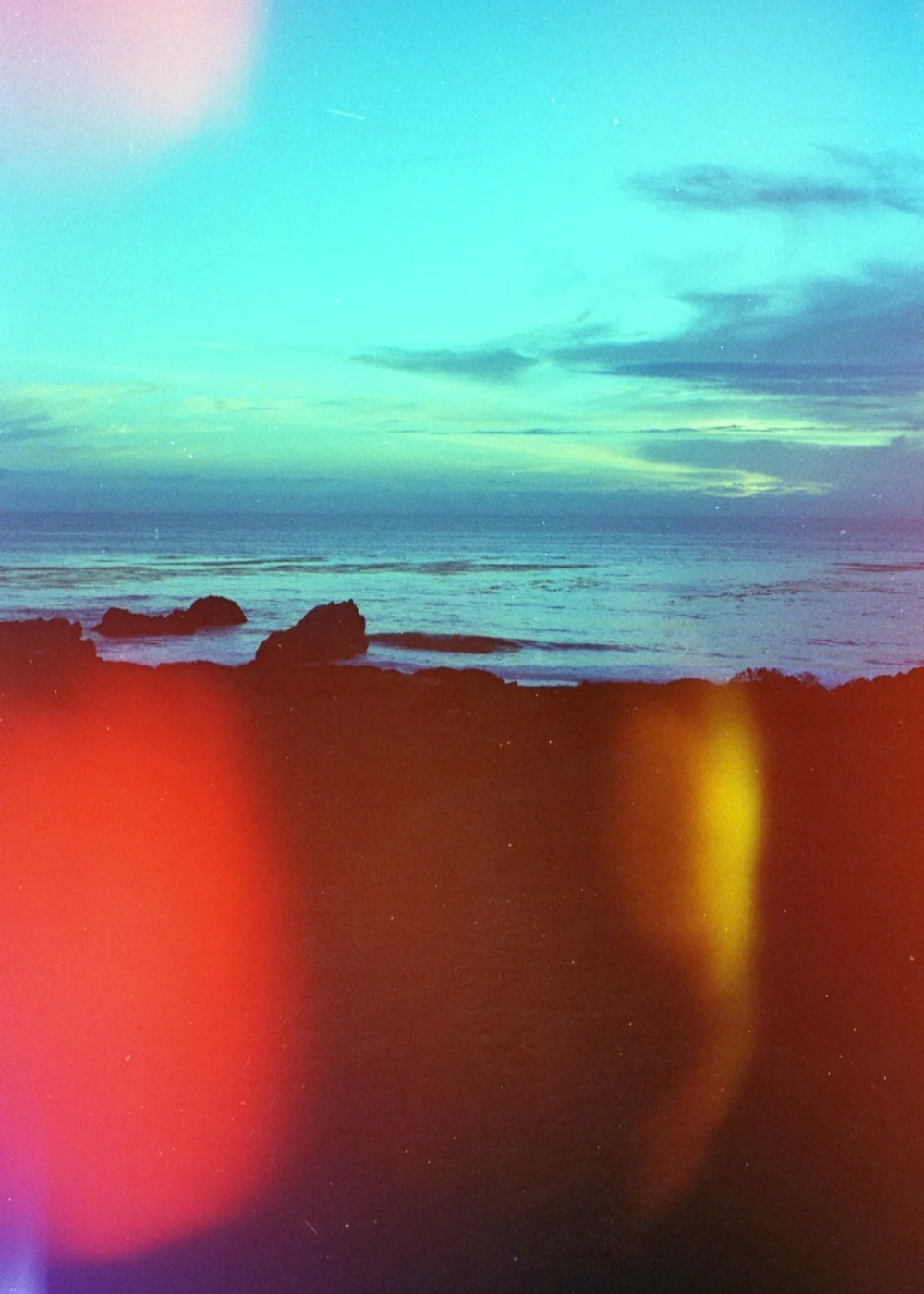 Psych Blues #3 pre-exposed 35mm experimental film photo of the ocean