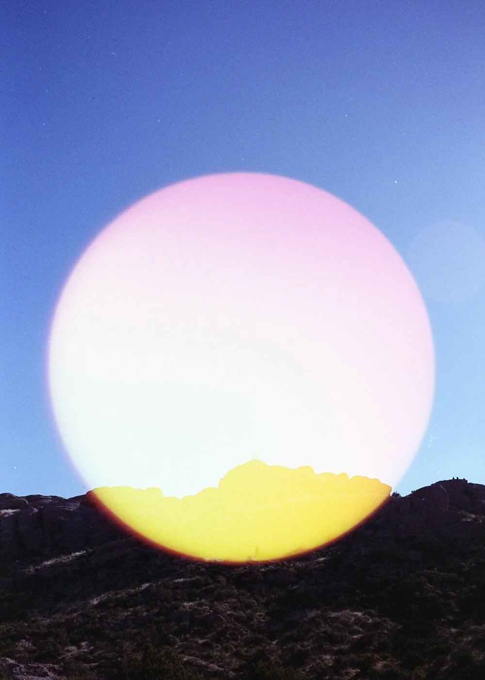 Psych Blues #6, experimental 35mm film image of a blue sky