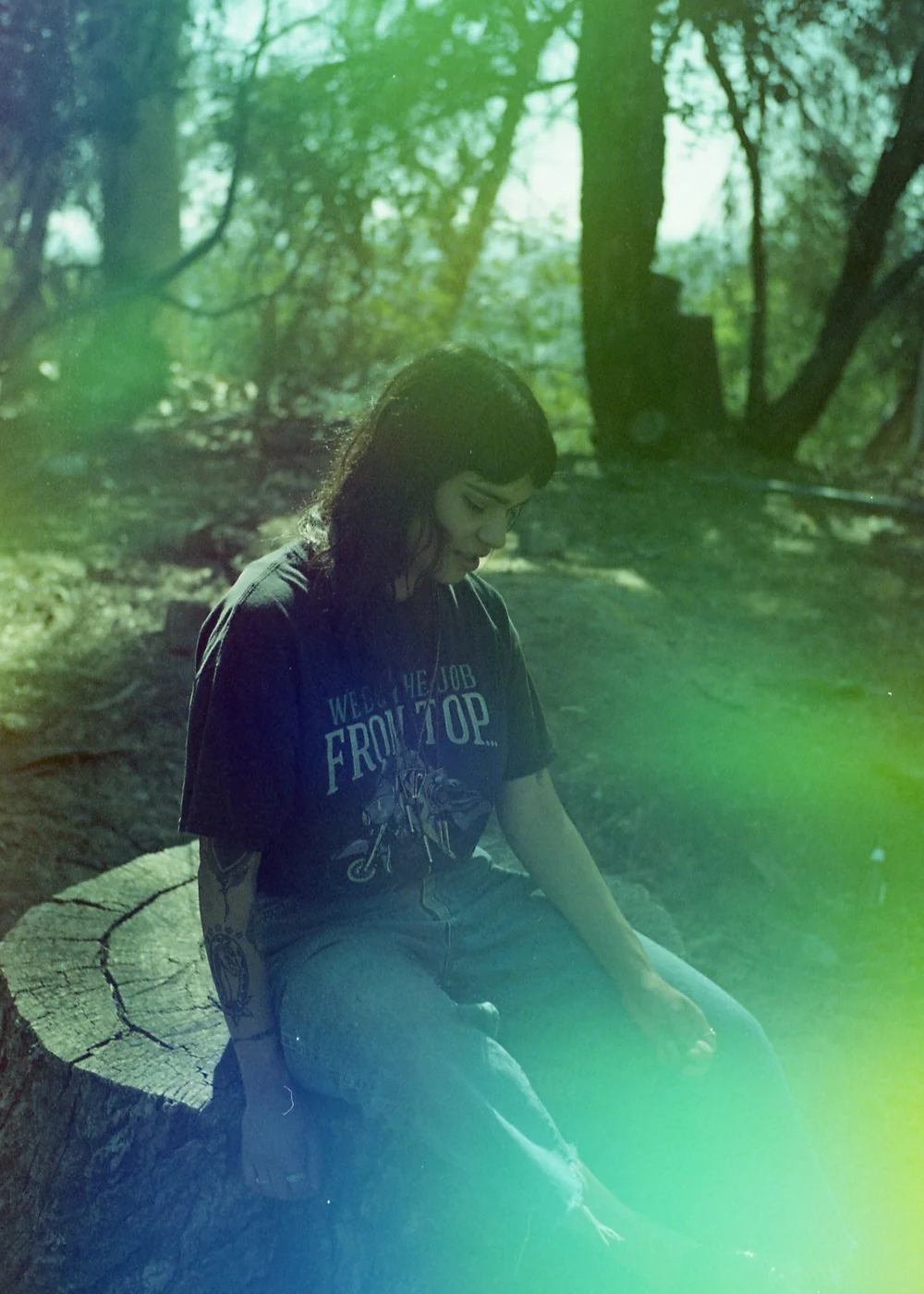 Girl in black shirt shot on Psych Blues 4, an experimental film stock