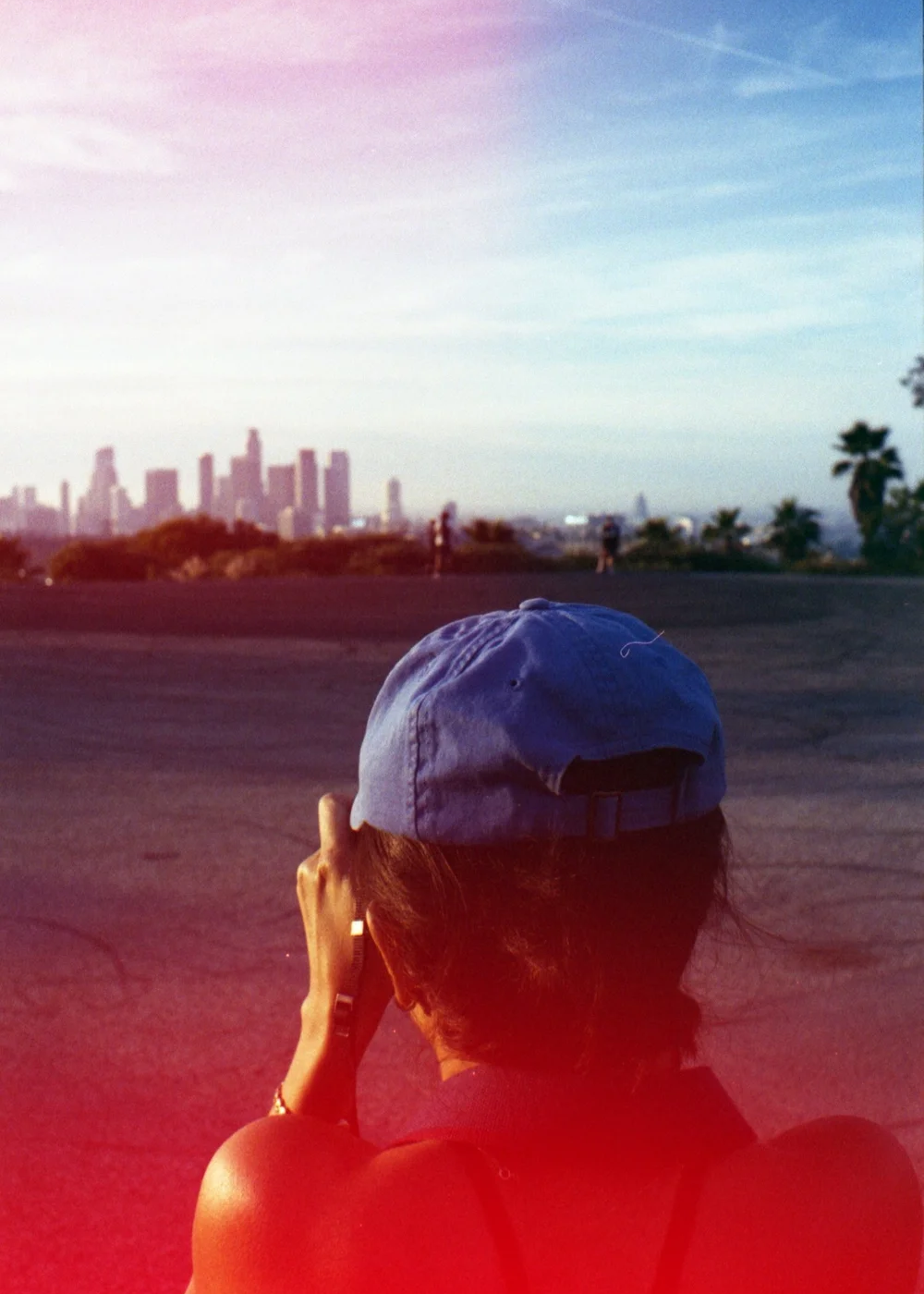 Psych Blues #8 pre-exposed 35mm experimental film photo of a girl in a hat