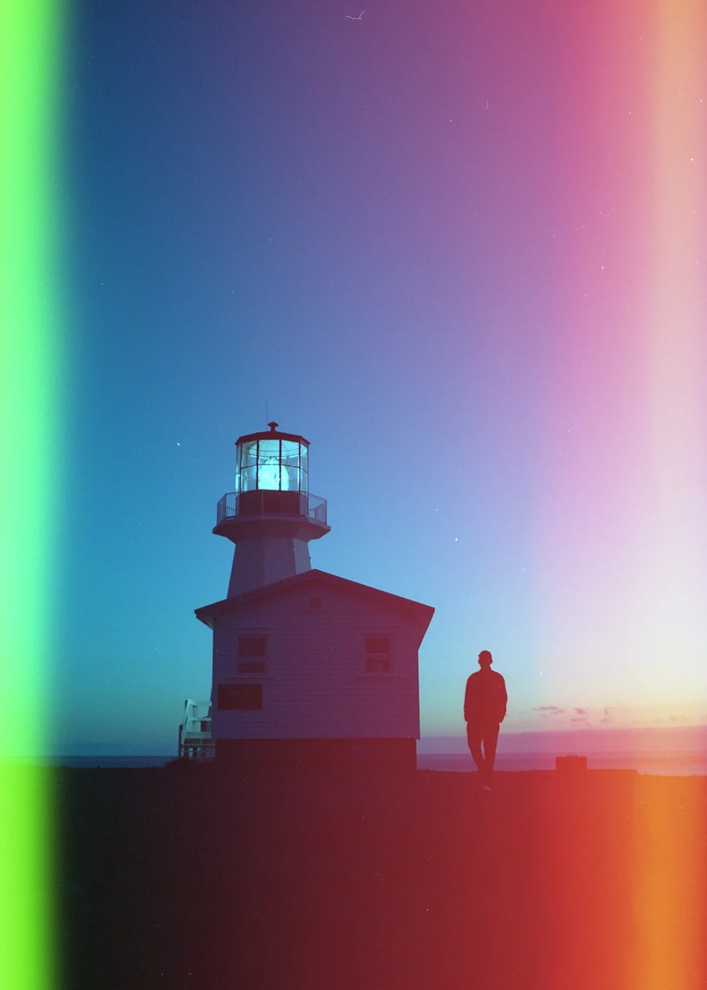 Psych Blues #2 pre-exposed 35mm experimental film photo of a lighthouse
