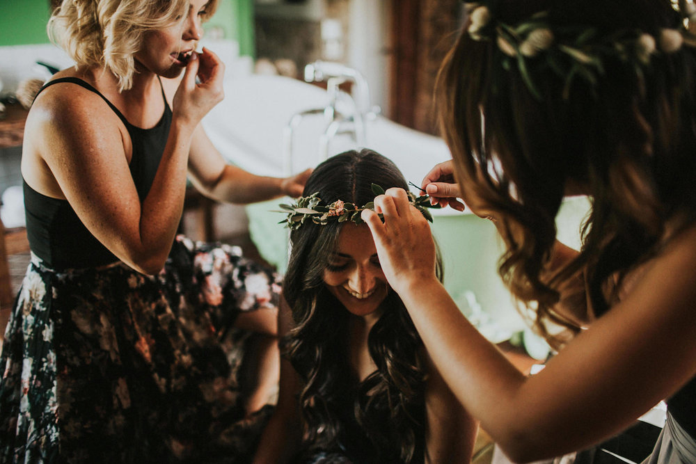 bridesmaids creating floral crowns in olivella 