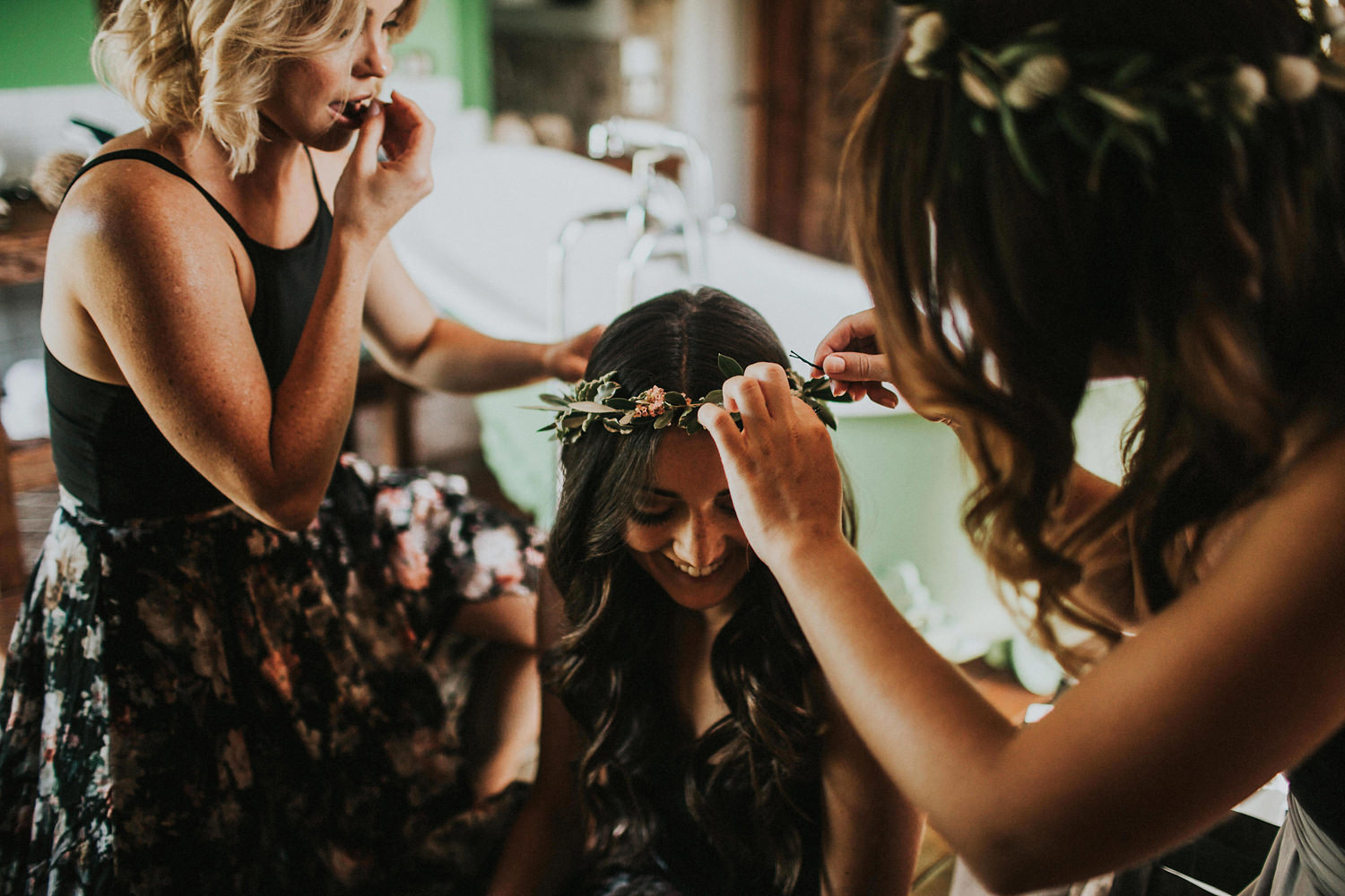 bridesmaids creating floral crowns in olivella