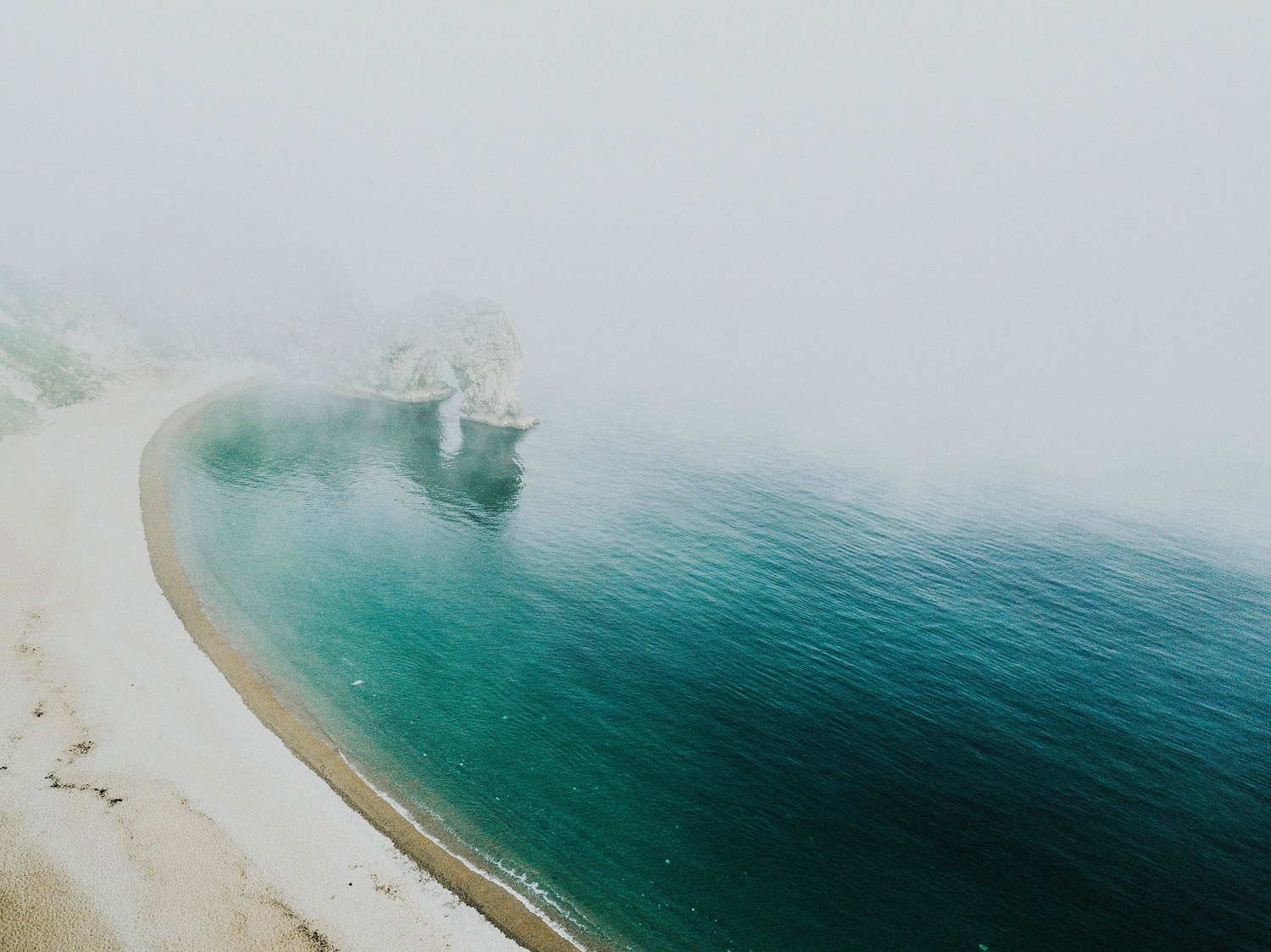 durdle door morning fog