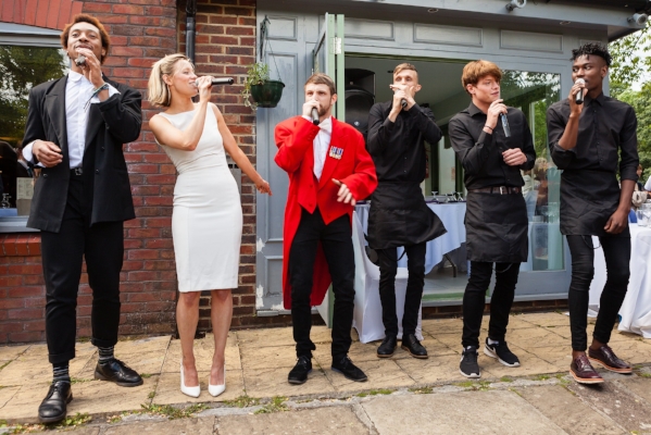Our singing waiters, toastmaster and guests flash mobbed this beautiful wedding in June