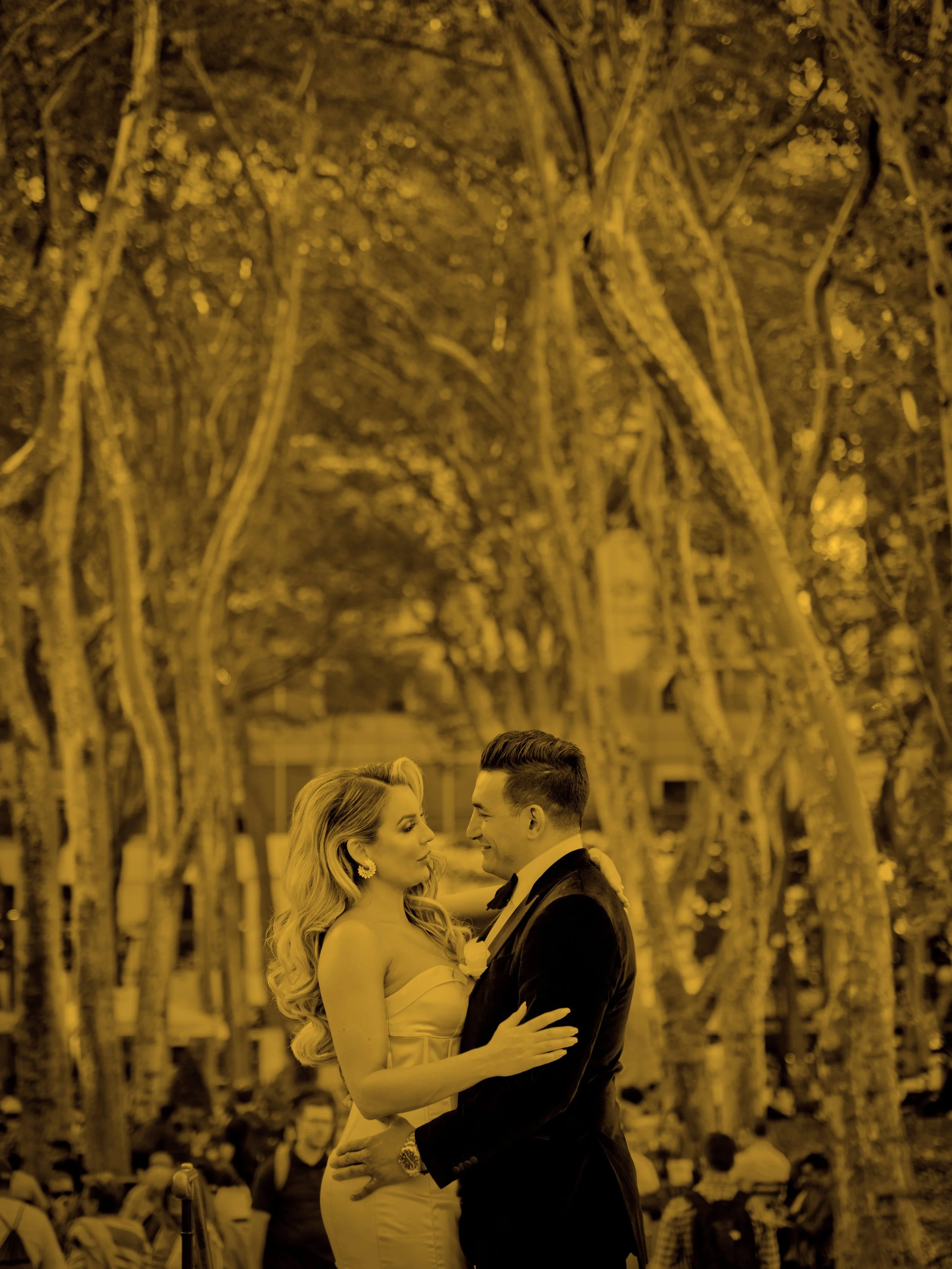 Bride and groom portrait beneath the trees in Bryant Park Midtown Manhattan wedding photography