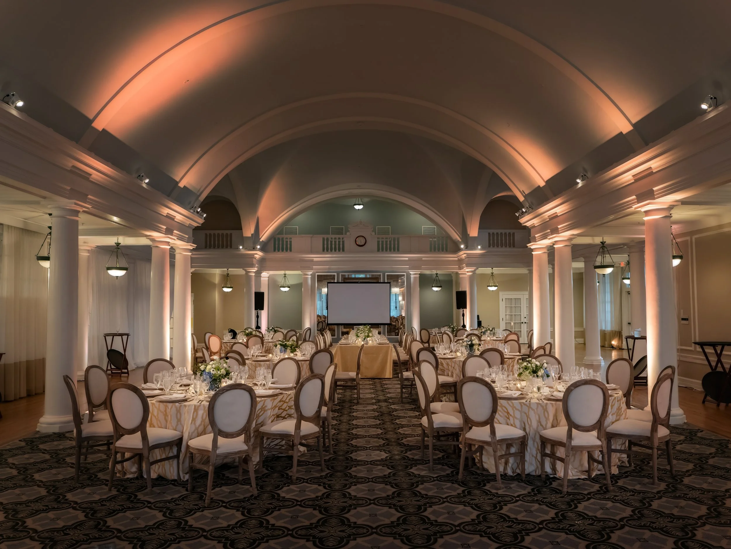 The Donald Ross Room at Pinehurst Resort set and decorated for a rehearsal dinner.
