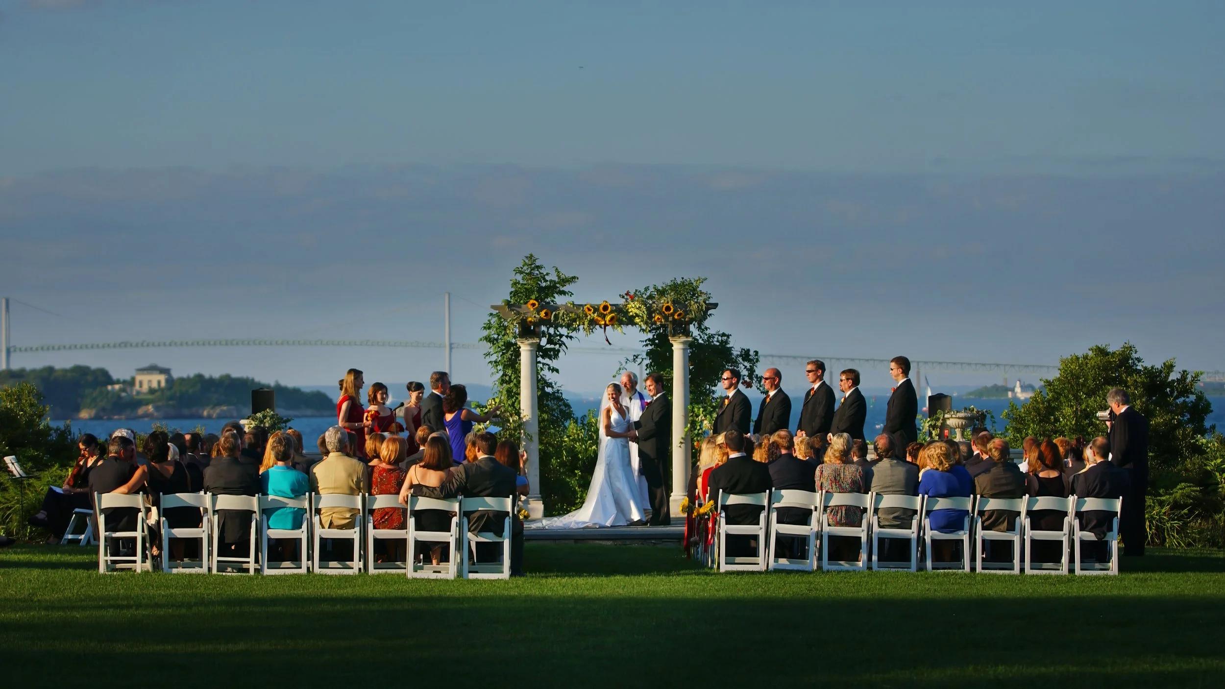 Sweeping view of a wedding ceremony at Castle Hill in Newport, Rhode Island