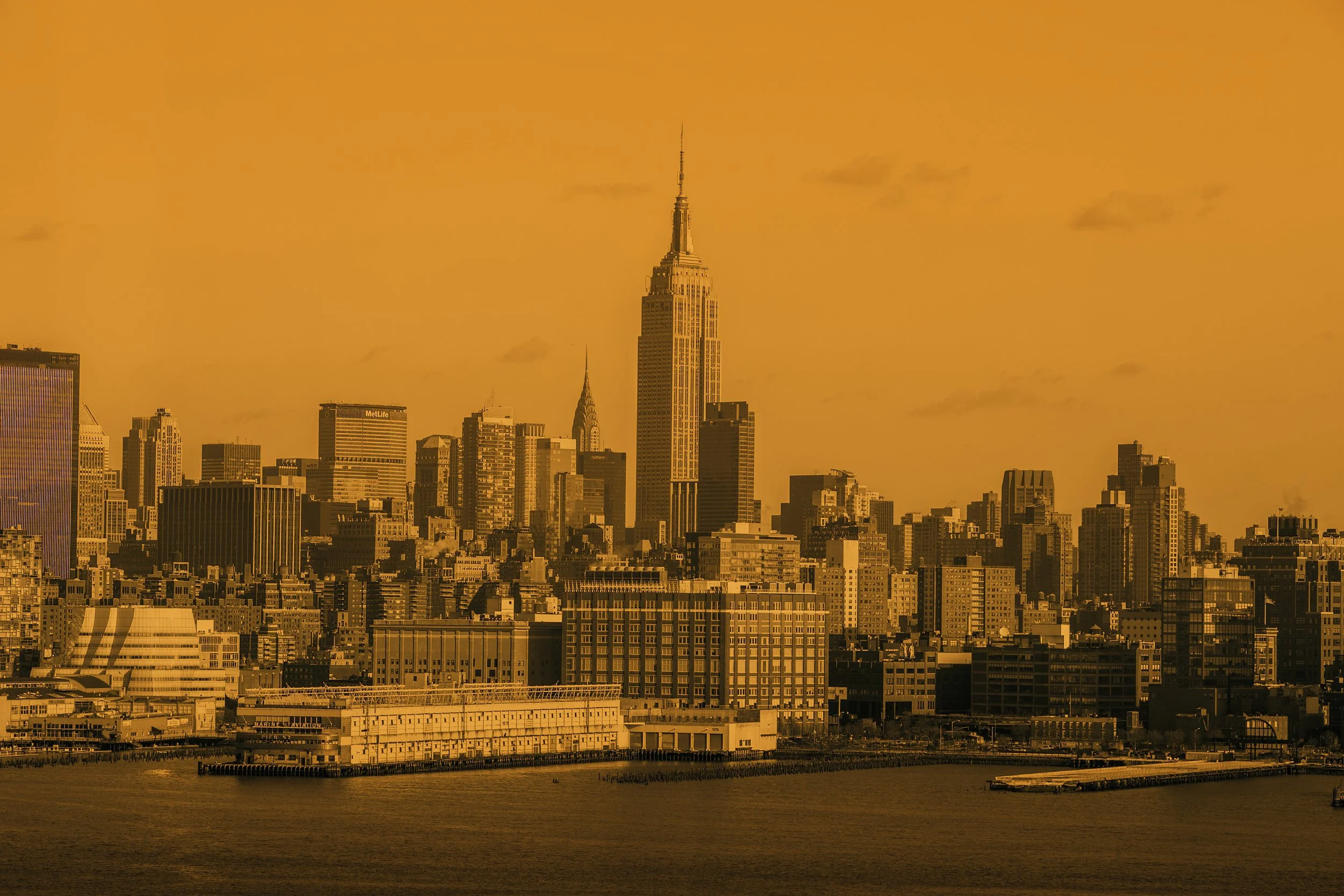 Fine art split-tone photograph of the New York City skyline captured from W Hoboken.