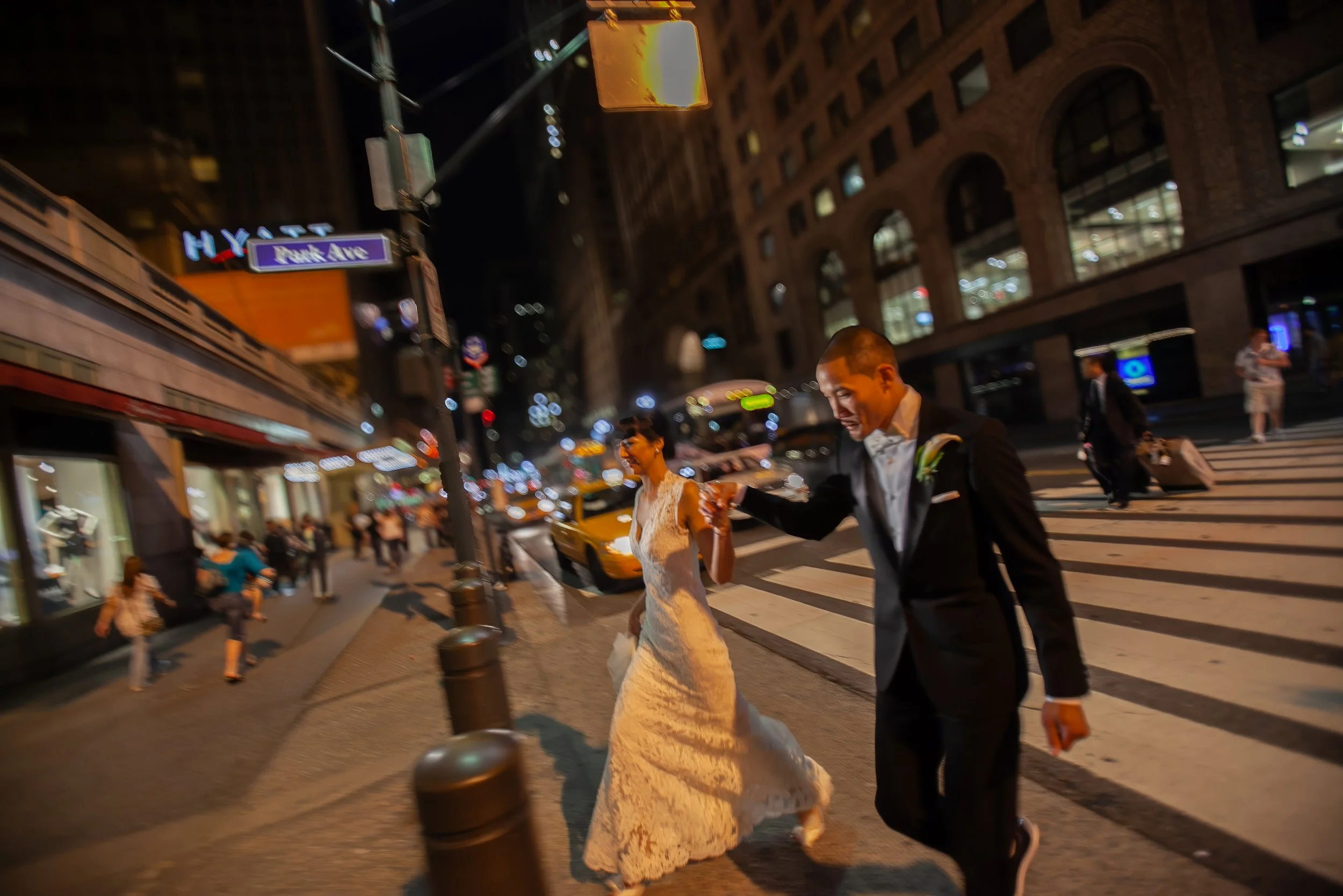 Bride and Groom Crossing Park Avenue Near Cipriani 42nd Street in New York City