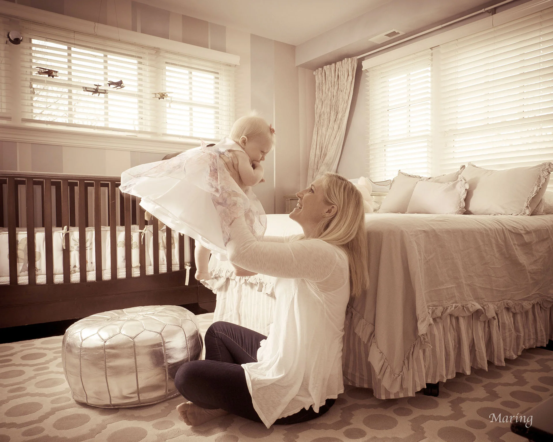 Mommy and me on my first birthday at home in my bedroom.