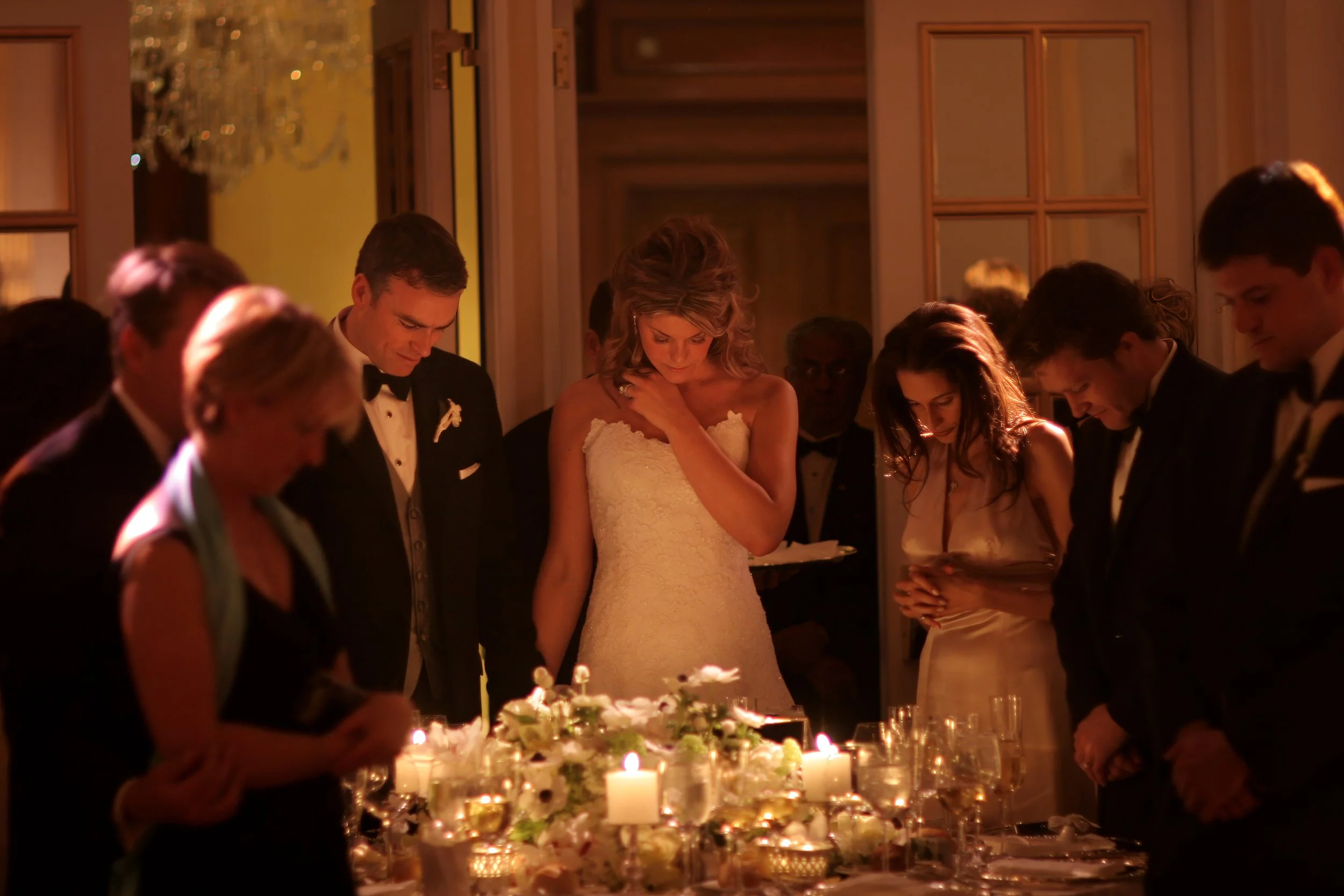 A blessing in the ballroom at a wedding at the New York Palace Hotel