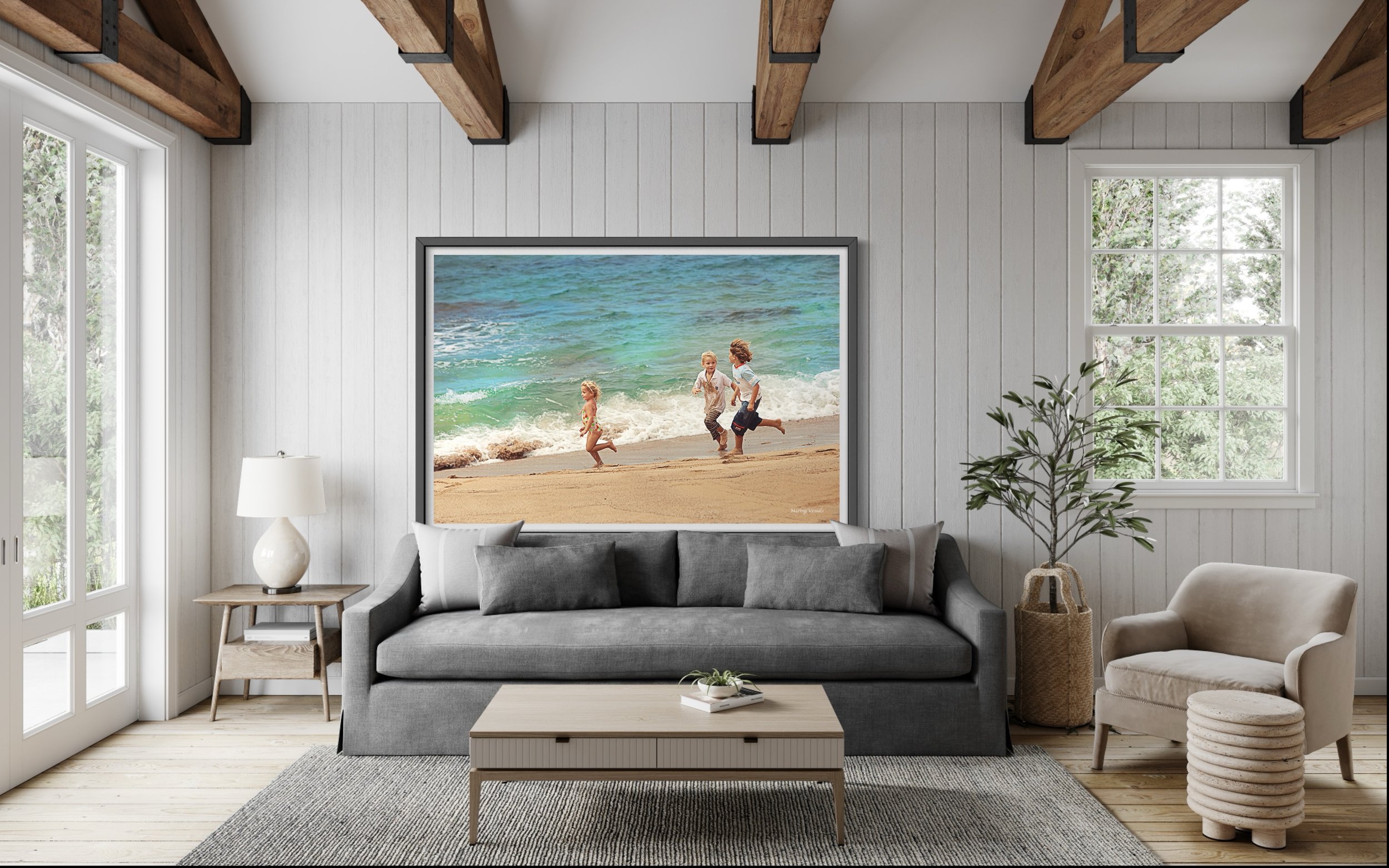 Playful portrait of siblings running on the beach by Maring Visuals