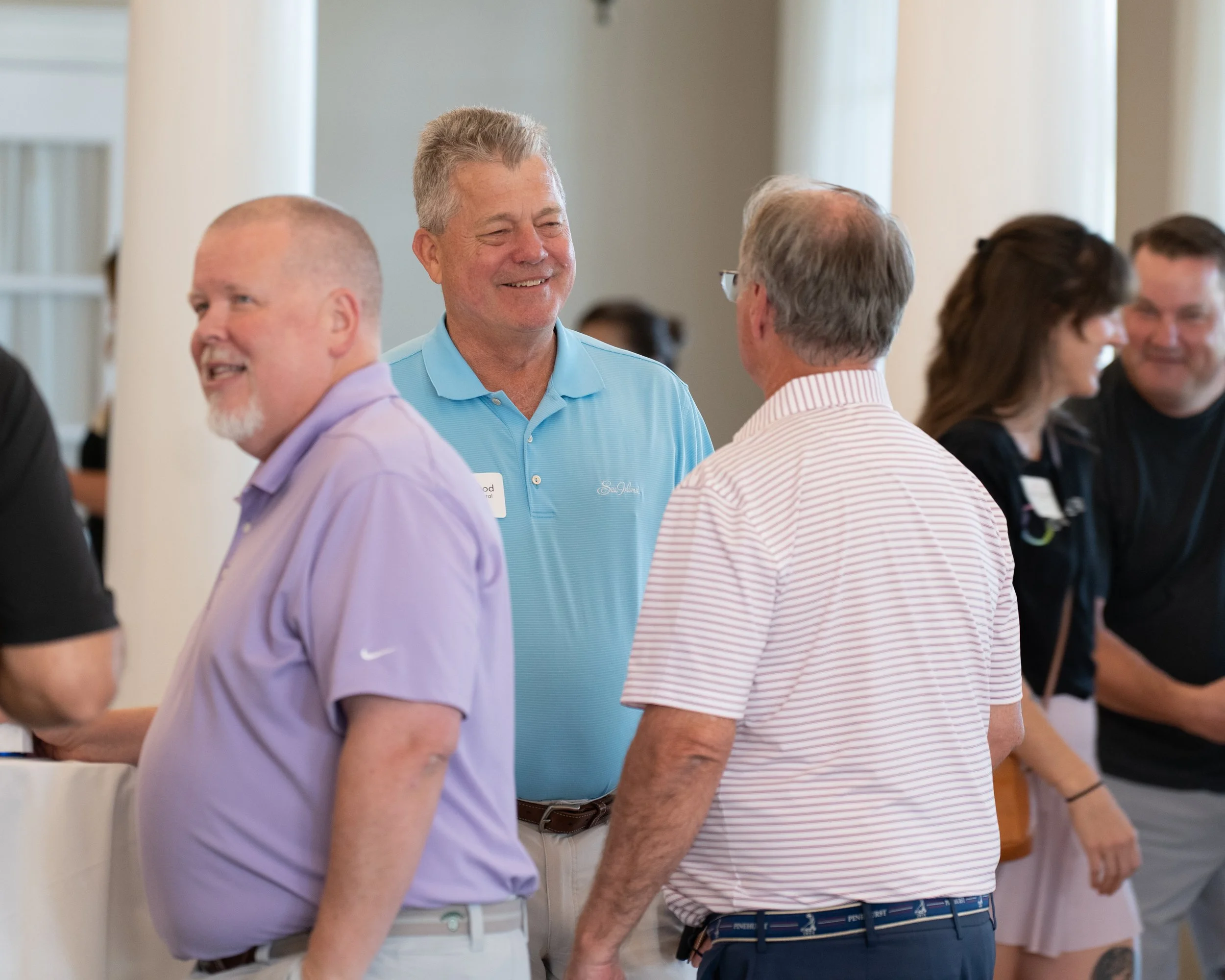 corporate-event-photographer-pinehurst-networking-casual-conversation.jpg