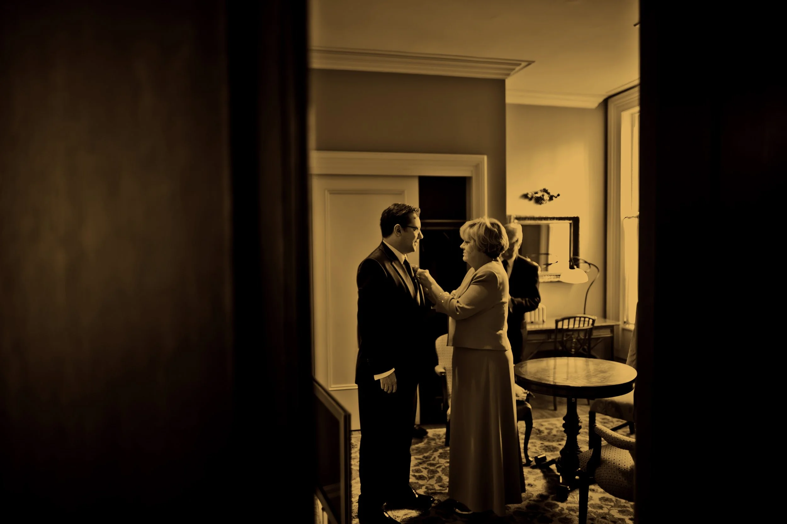 Mother Adjusts Boutonniere