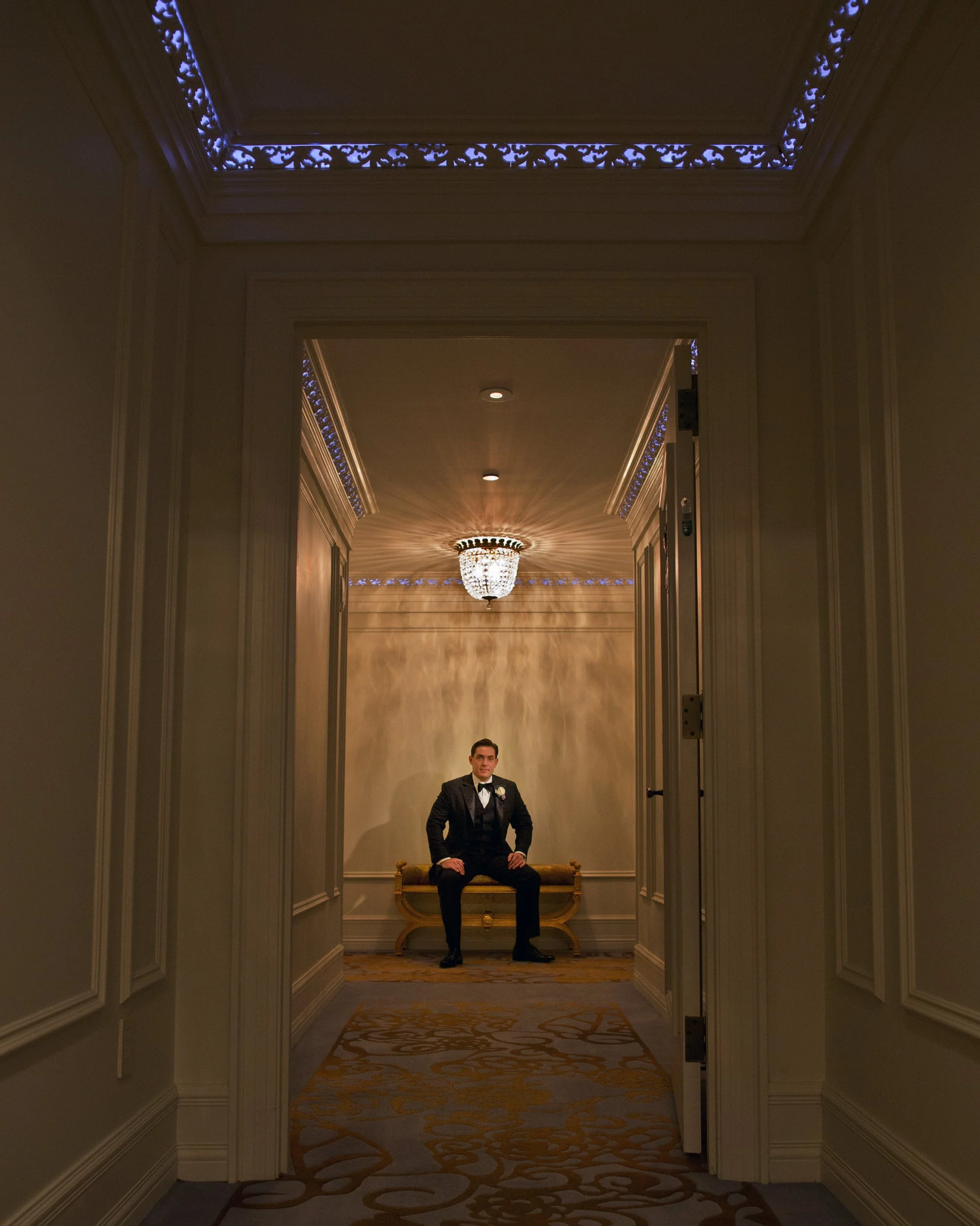 Groom Portrait Outside Suite