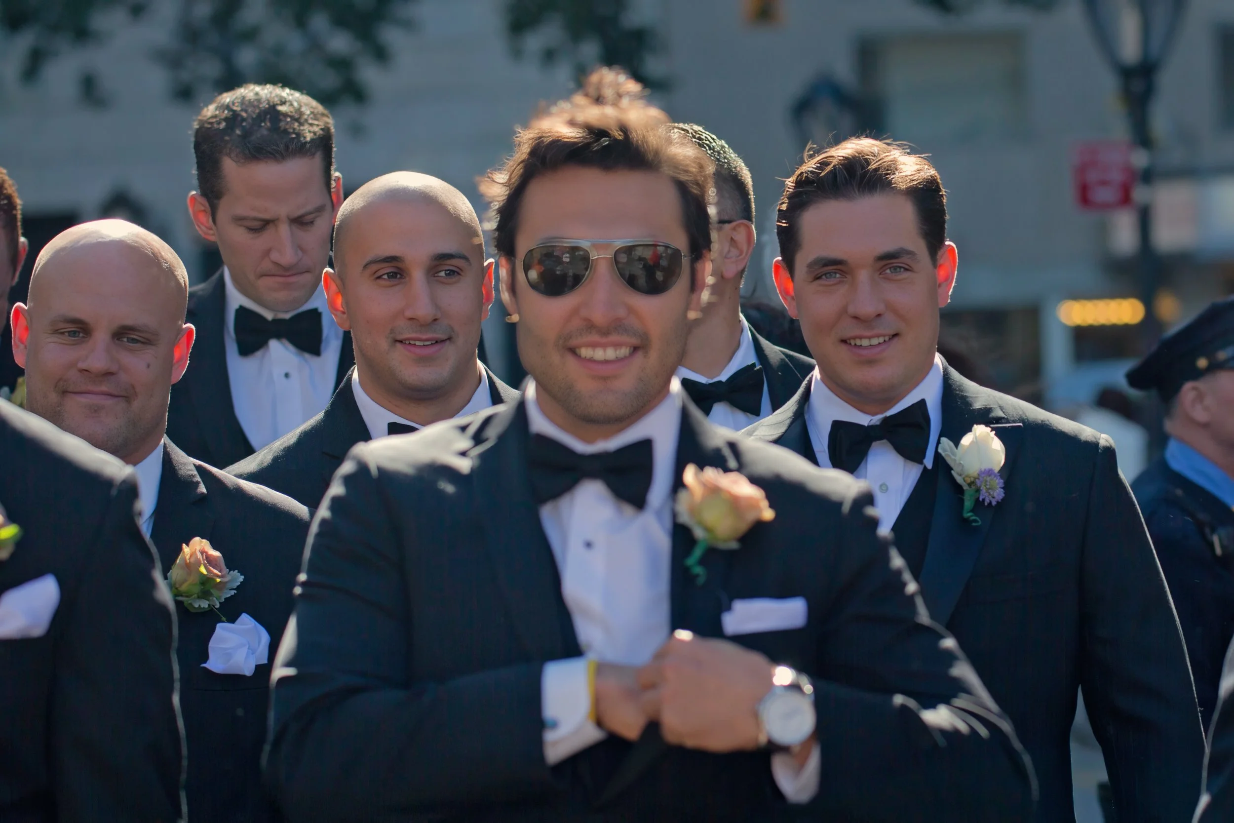Groomsmen Walking Outside the Plaza