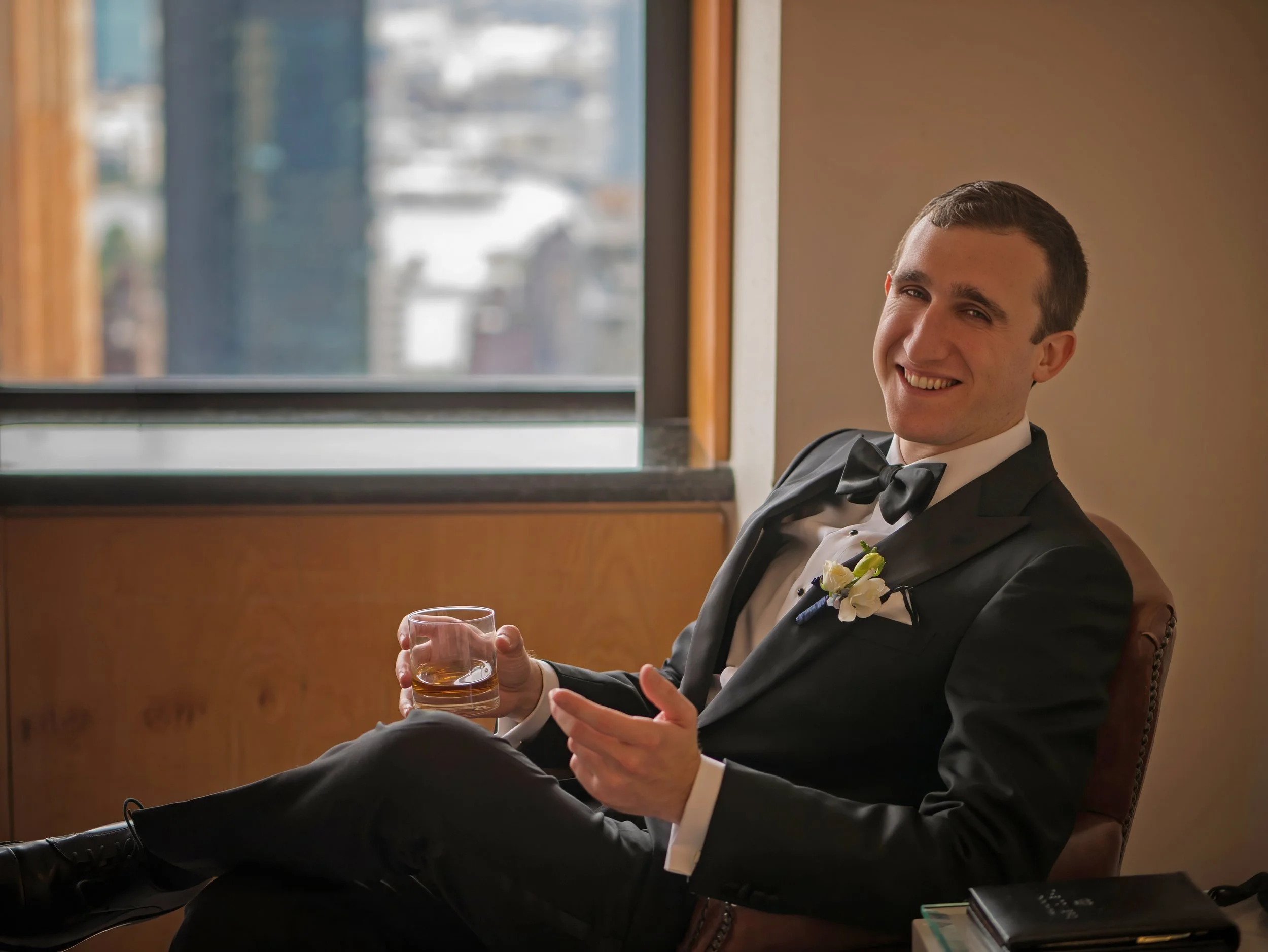 Groom Portrait in Suite