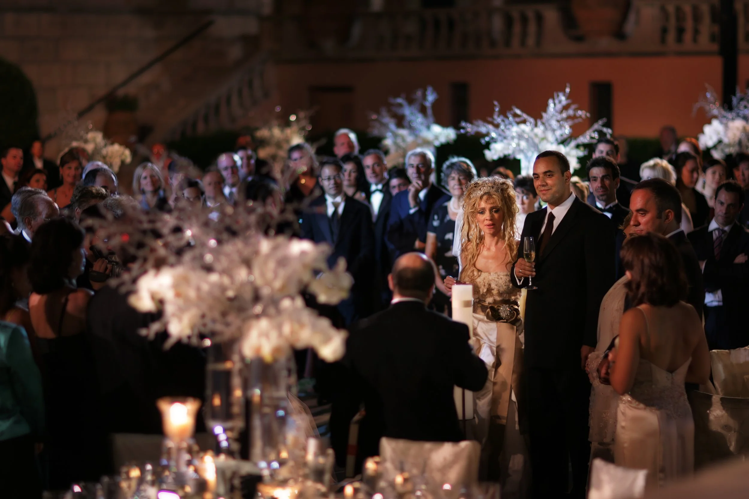 An emotion moment as a toast and special gift is given to the bride and groom.