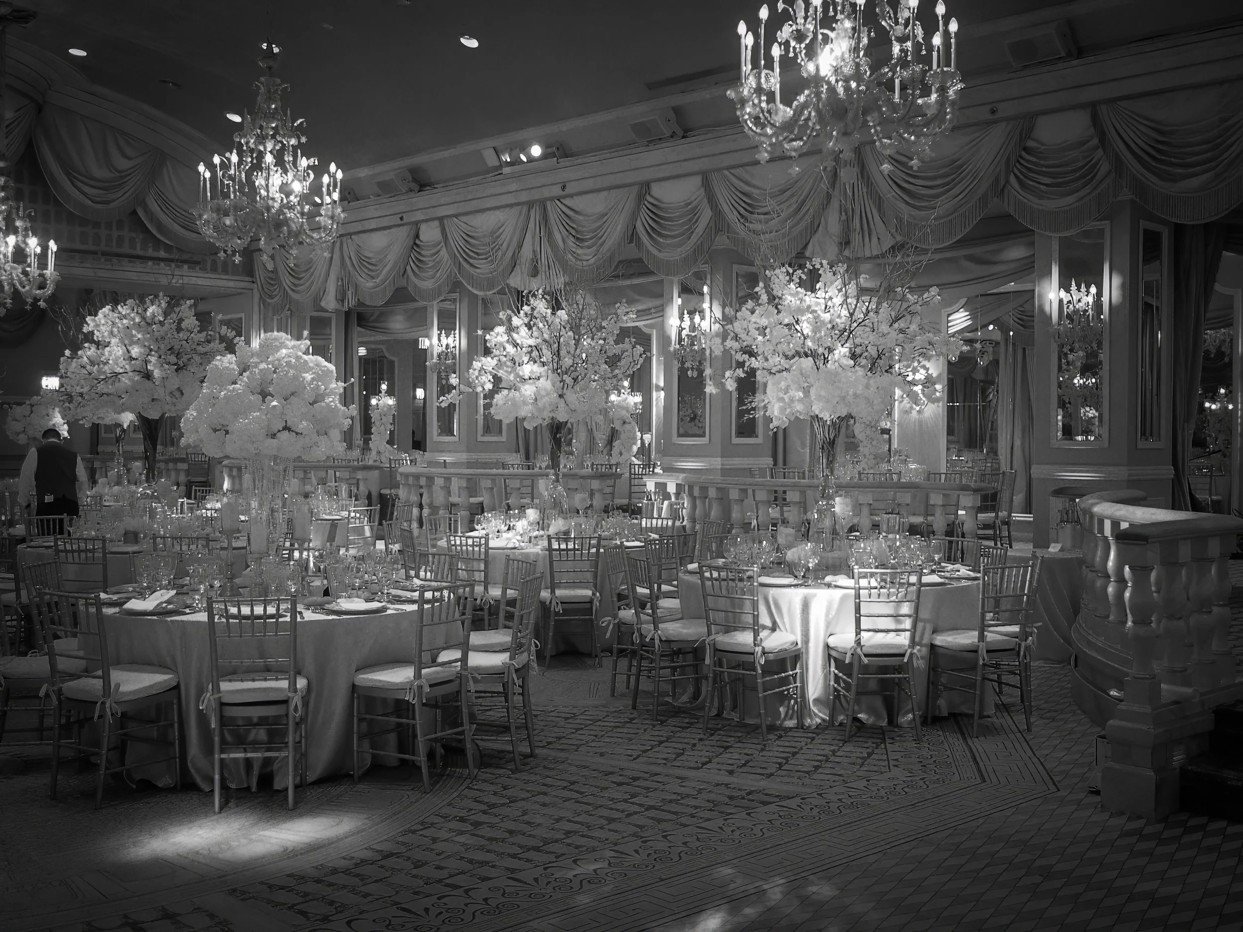 A joyful bride and groom enjoy their ceremony recessional, celebrating their marriage at The Pierre Hotel NYC.