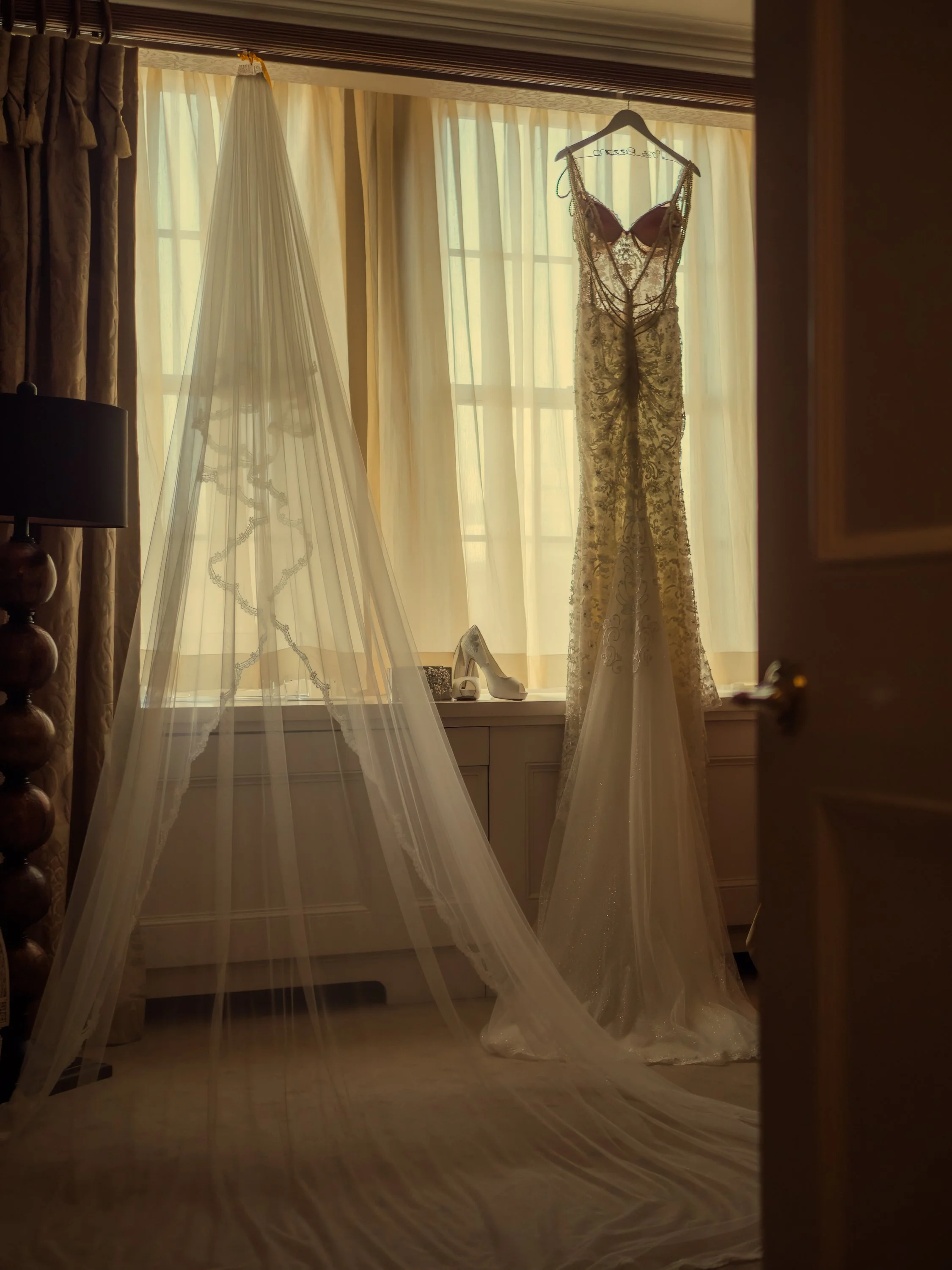 Wedding Dress and Details Displayed by Window