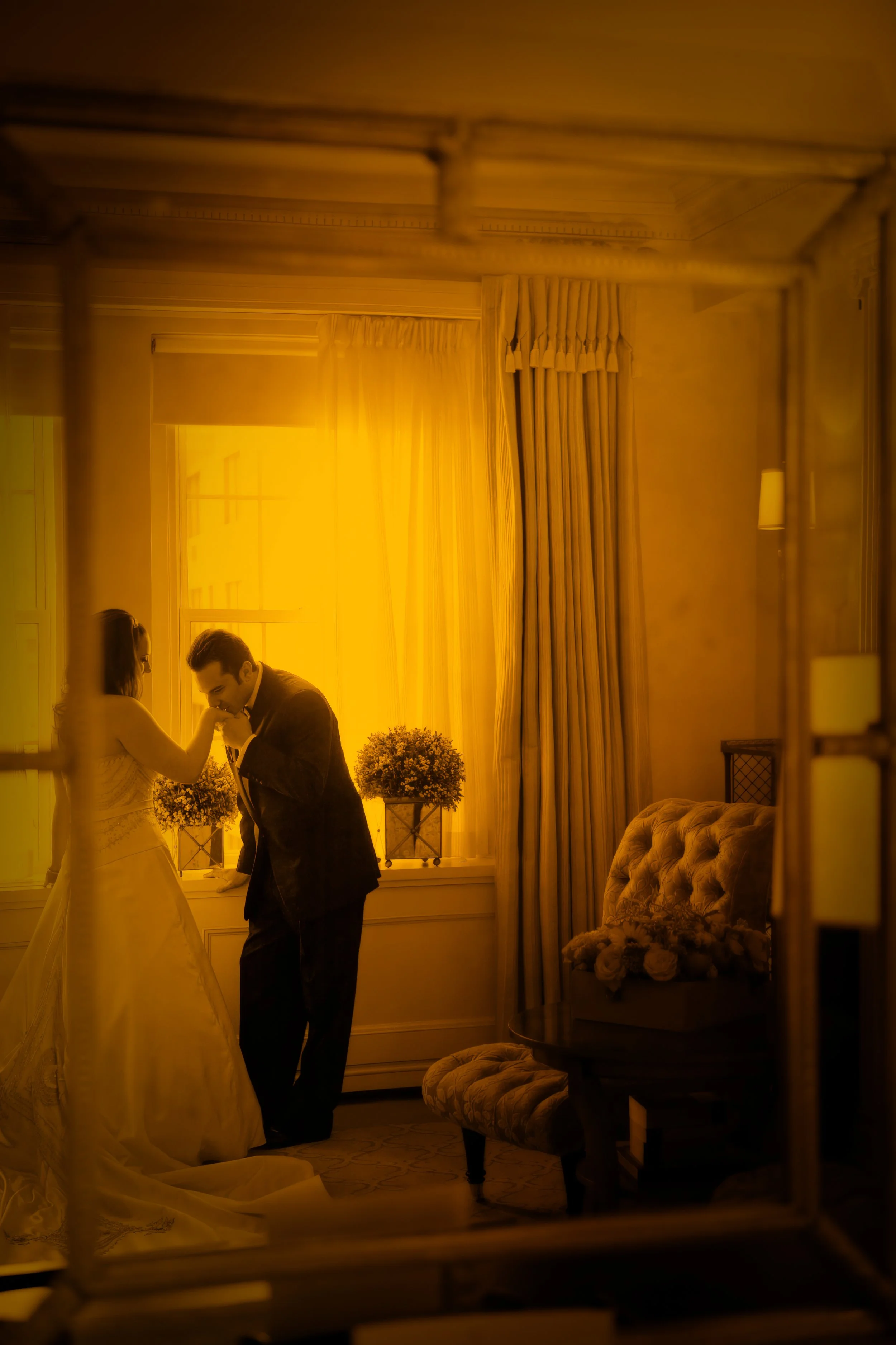 Groom Kisses Bride’s Hand During First Look