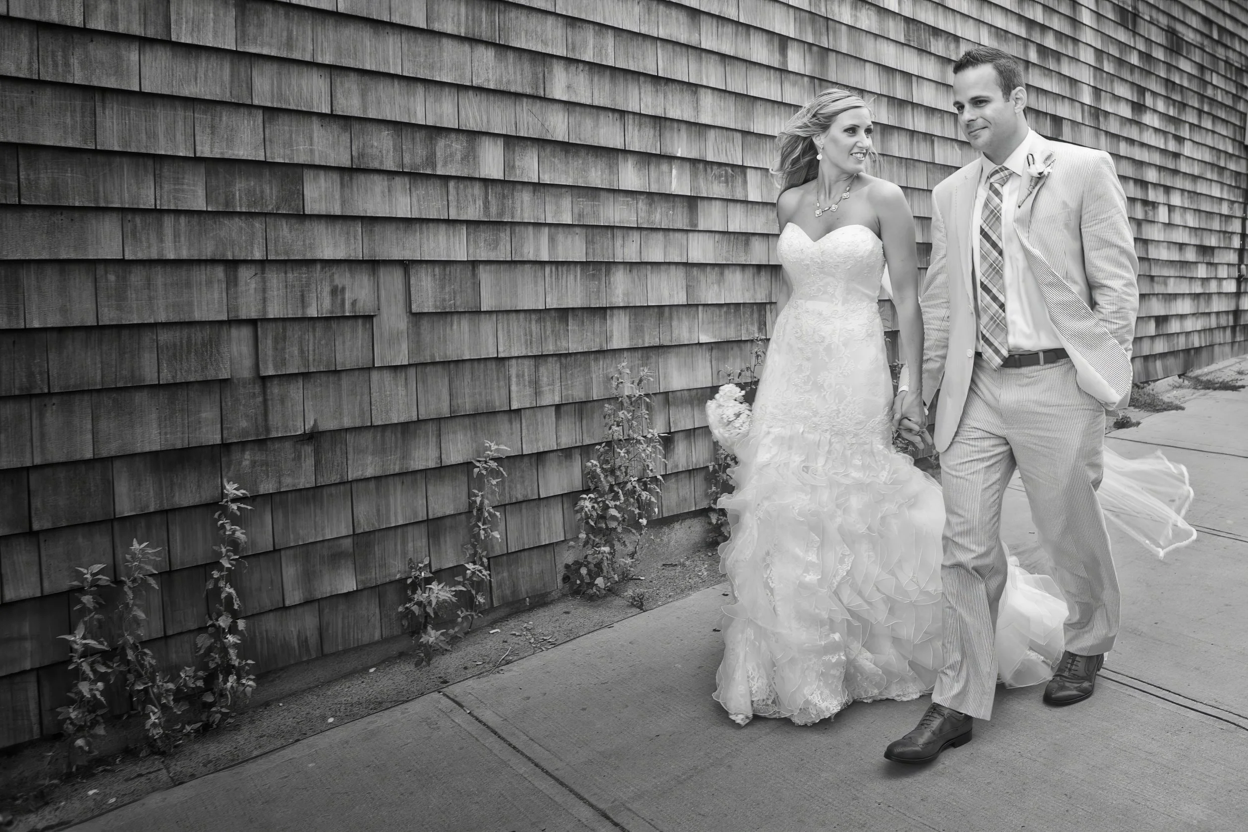 Bride and Groom Walking Through Historic Newport Streets