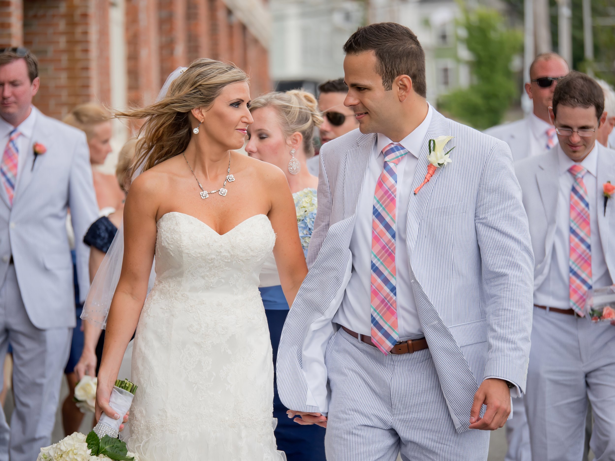 Wedding Party Walks Through Newport City Streets