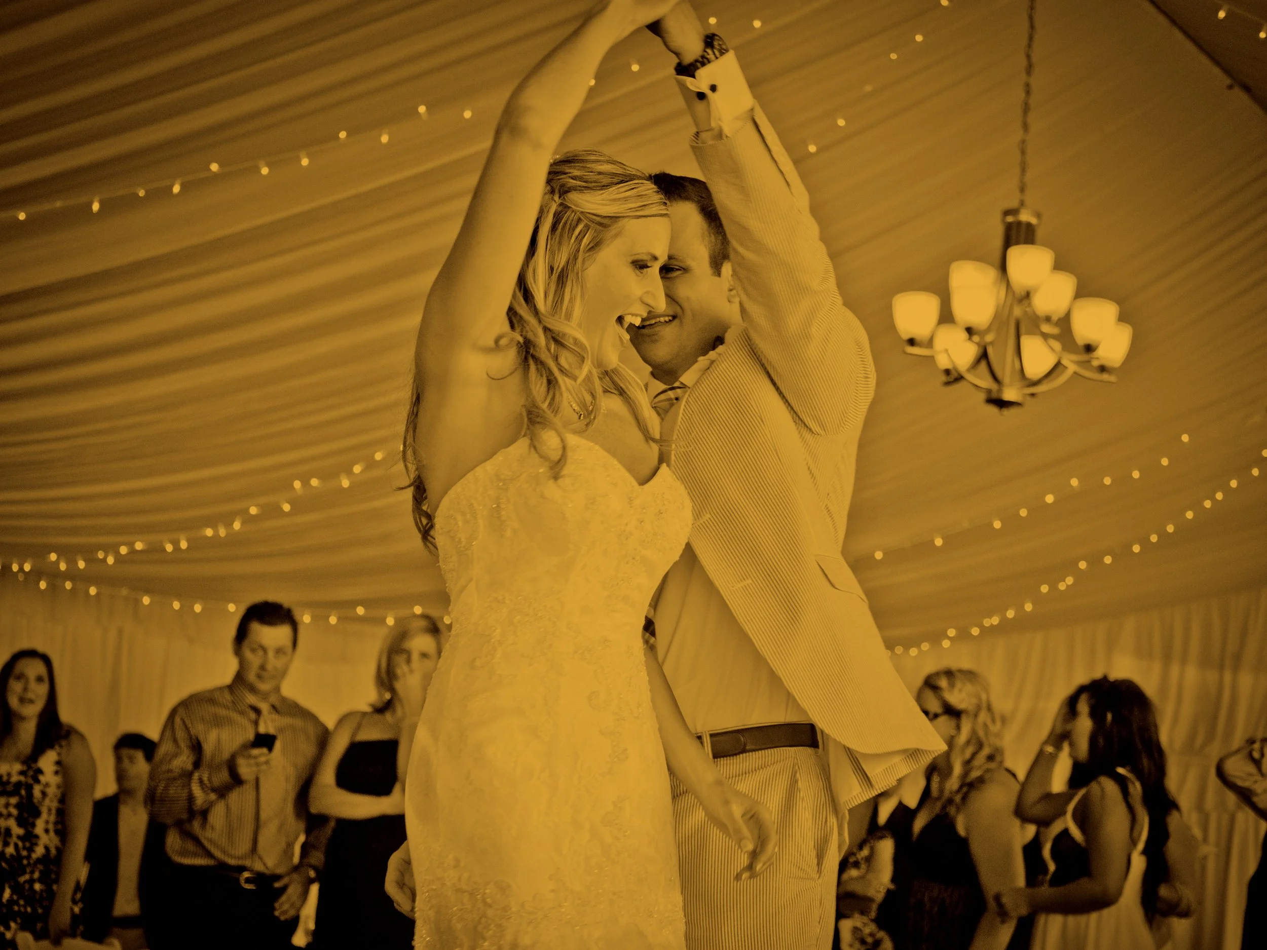 Bride and groom share a playful first dance at The Bohlin in Newport Rhode Island.