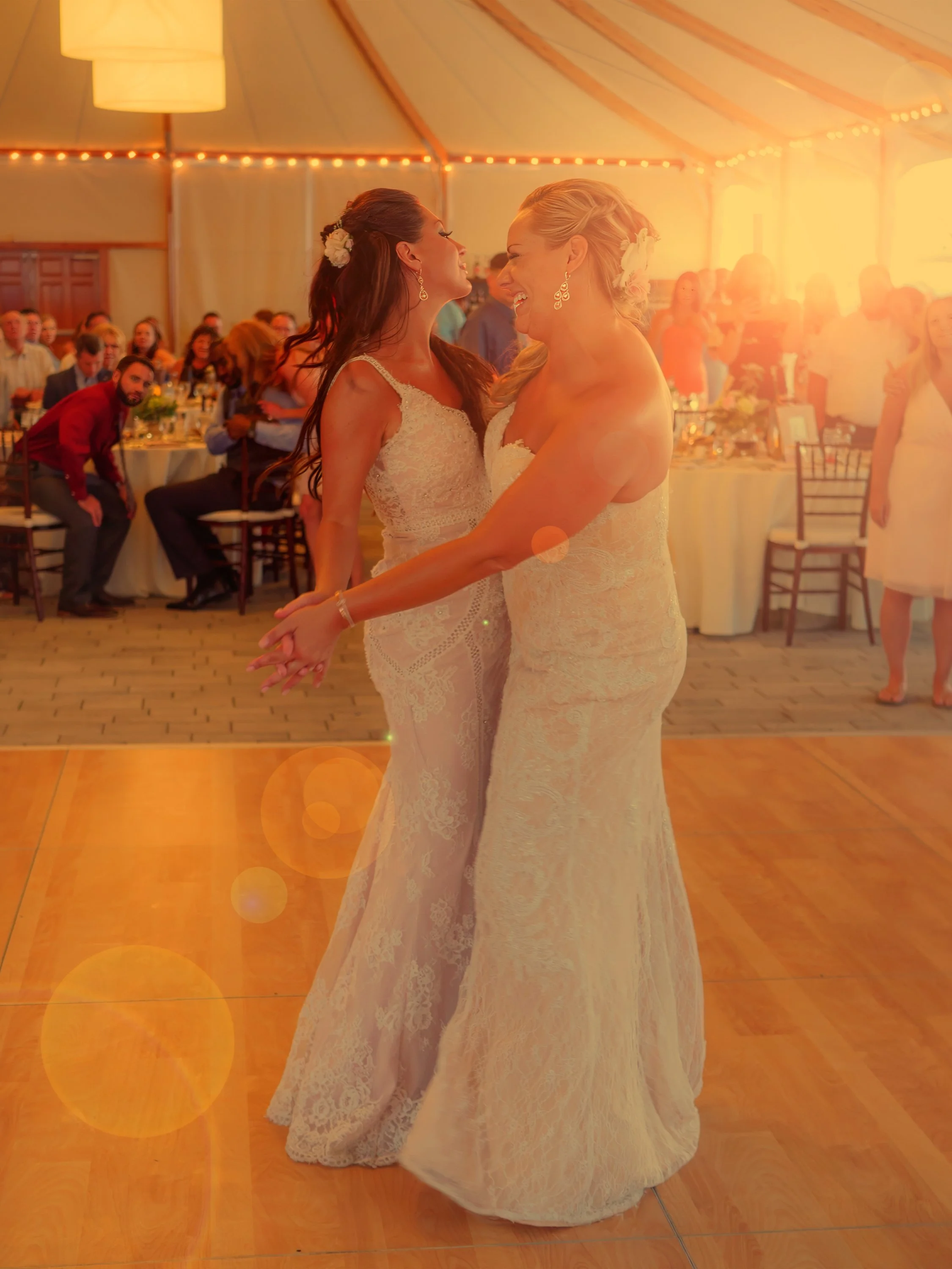 First Dance of Two Brides in Warm Afternoon Light