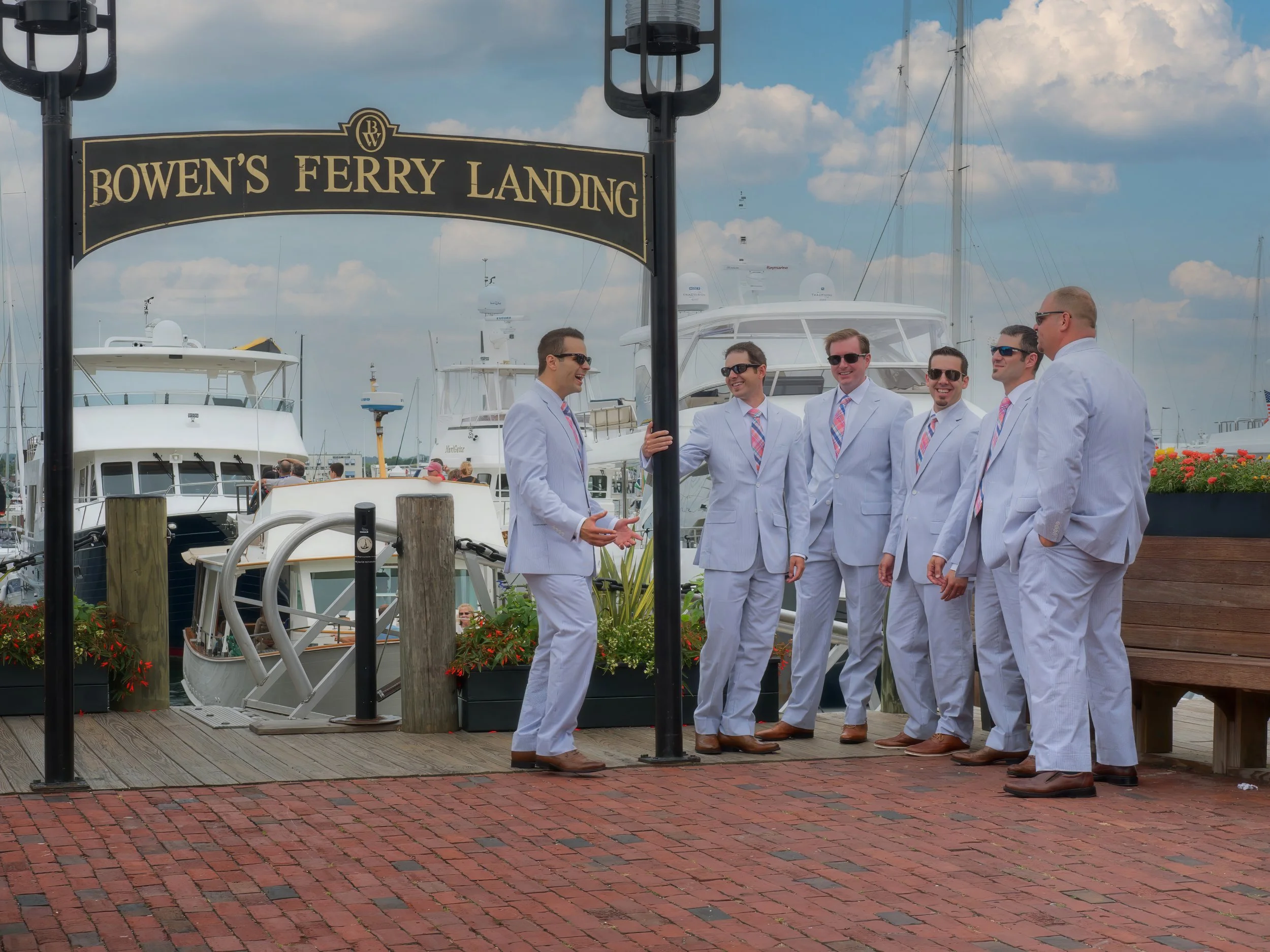 Groomsmen Laugh Together on the Docks