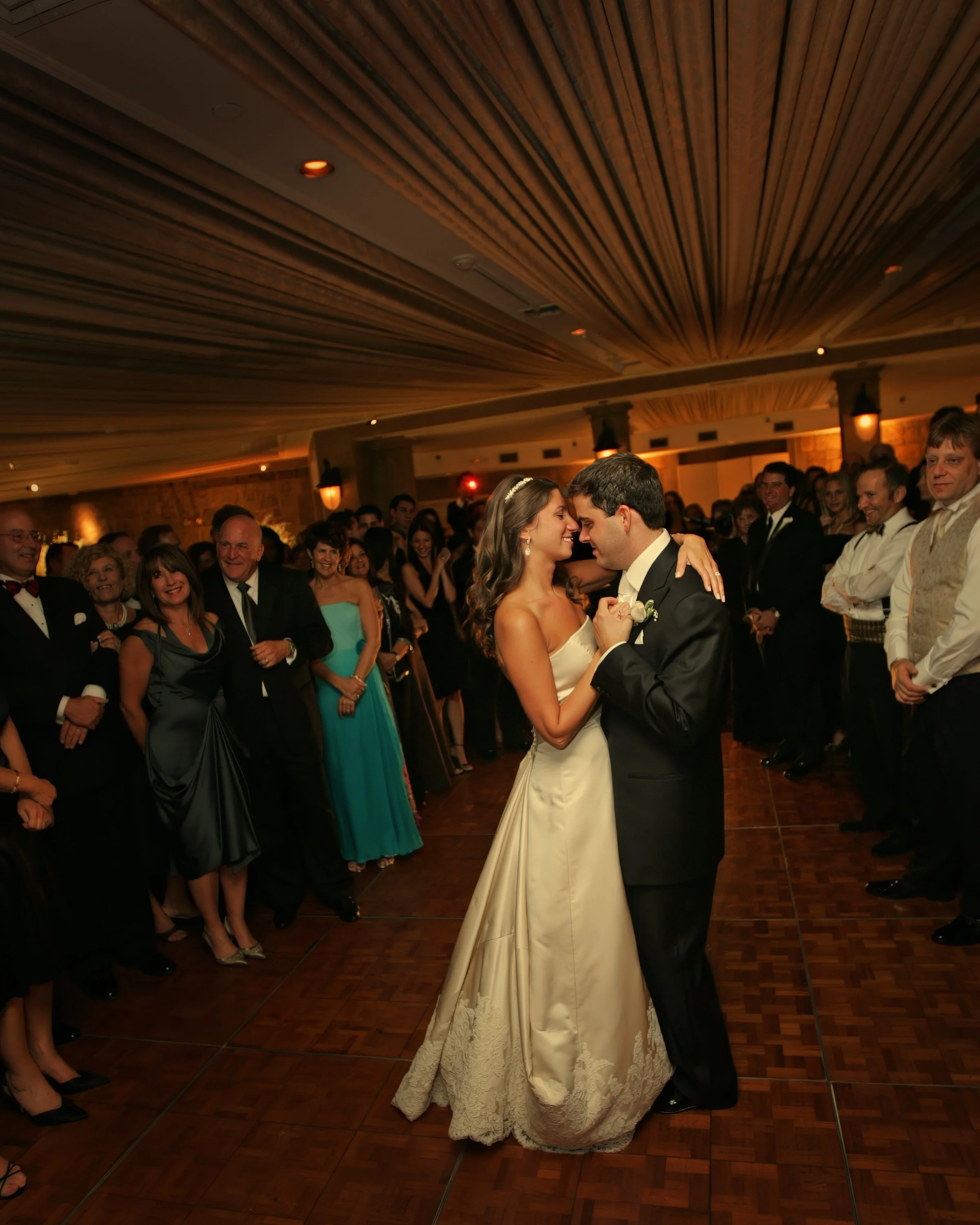Bride and groom share their first dance together as husband and wife in the elegant Tappan Hill Ballroom.