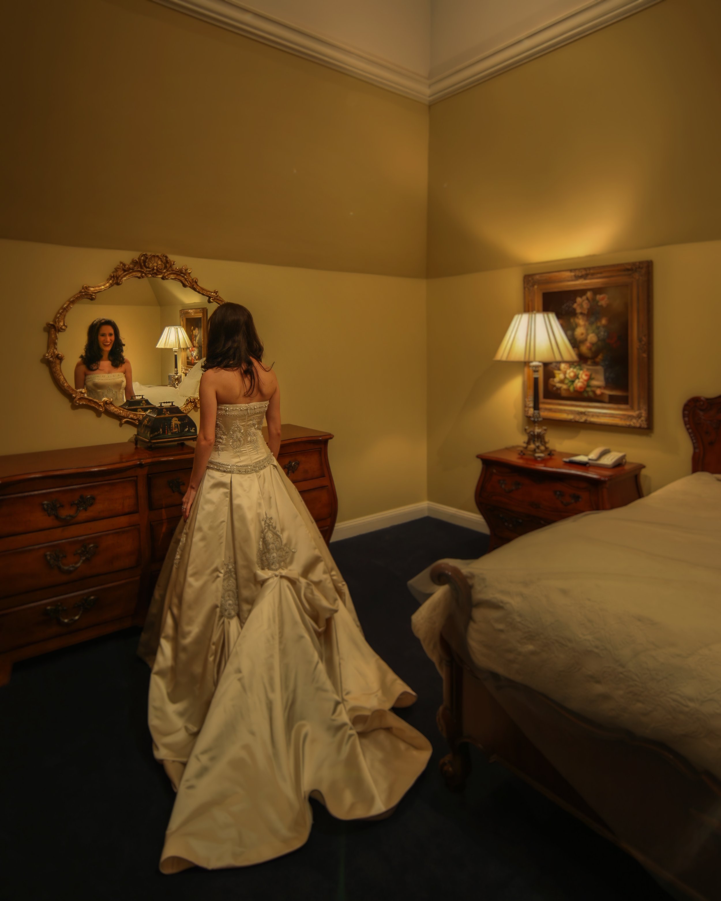 Bride Preparing in Mirror at Oheka Castle