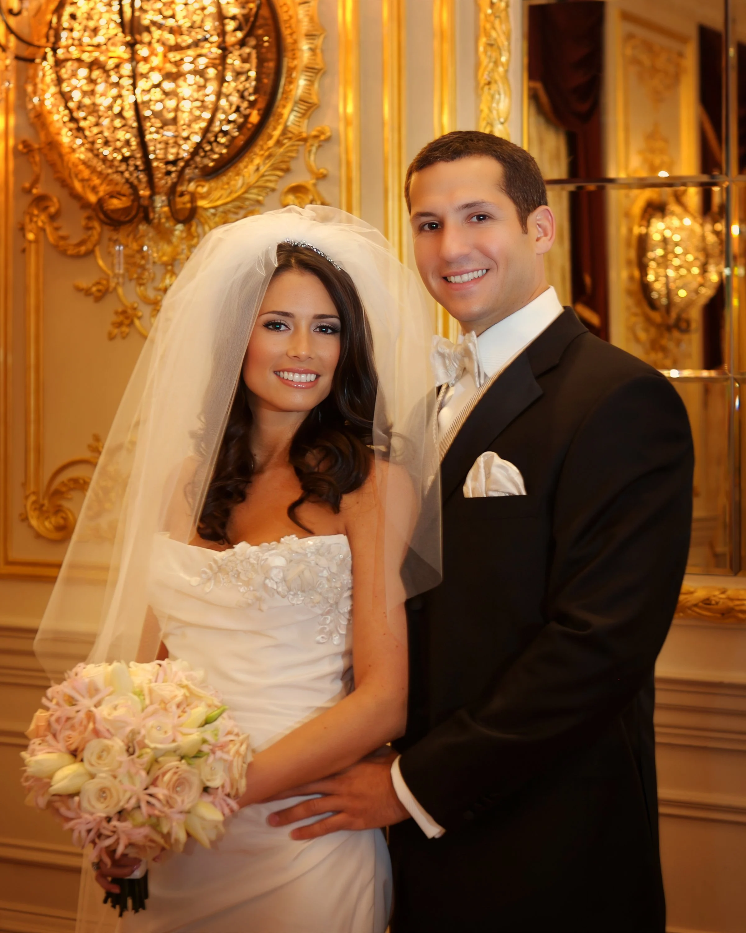 Classic luxury wedding portrait of a bride and groom inside an elegant salon at The St. Regis New York.