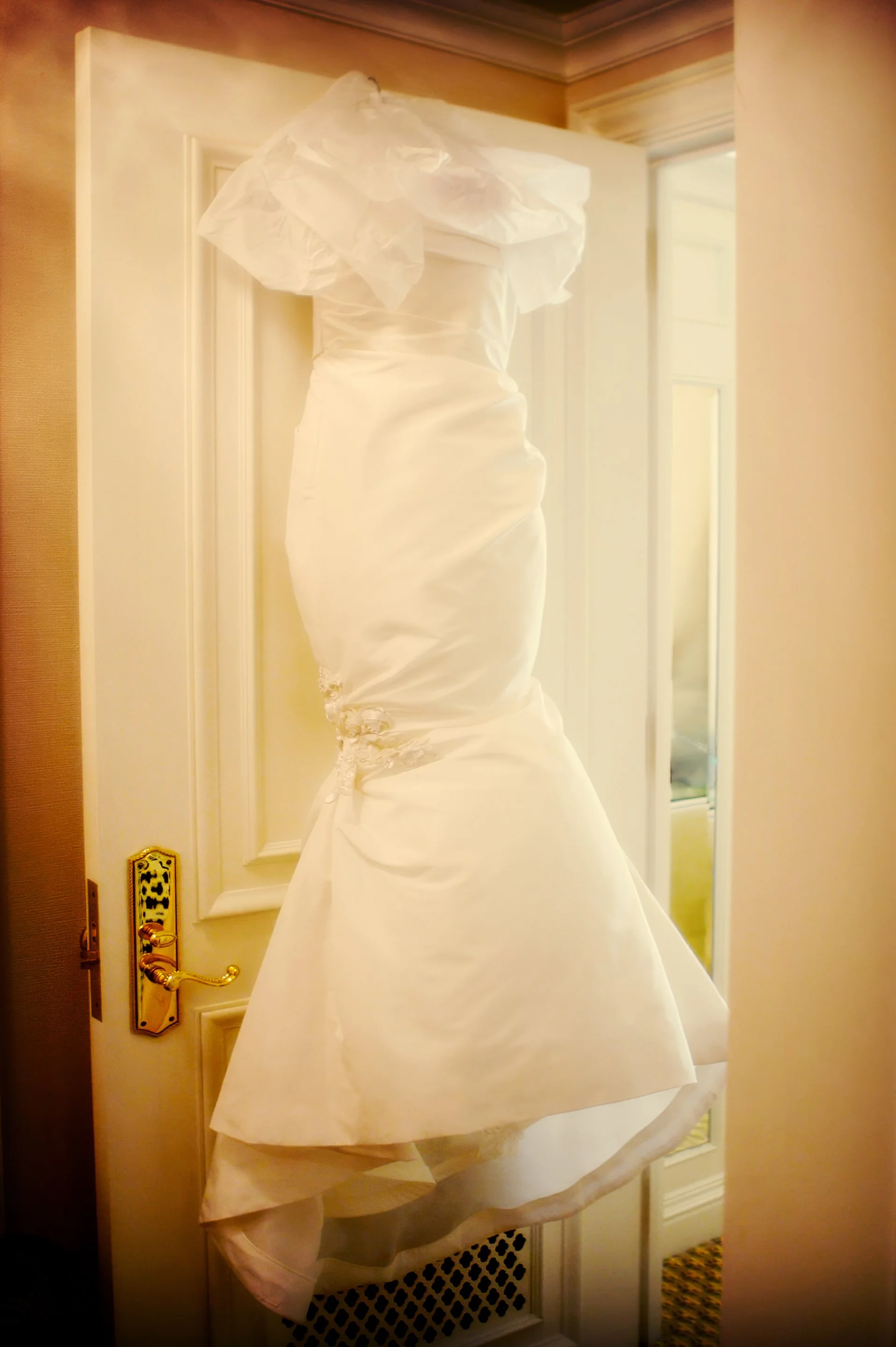 Wedding Dress Hanging in a St. Regis New York Suite