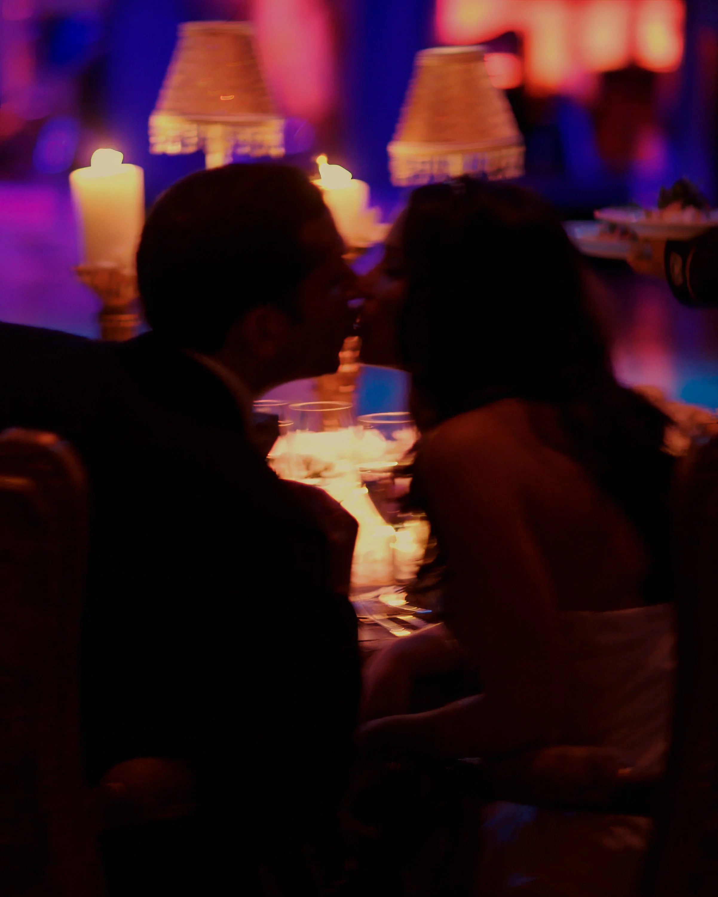 Silhouette Kiss at the dinner table at St. Regis New York