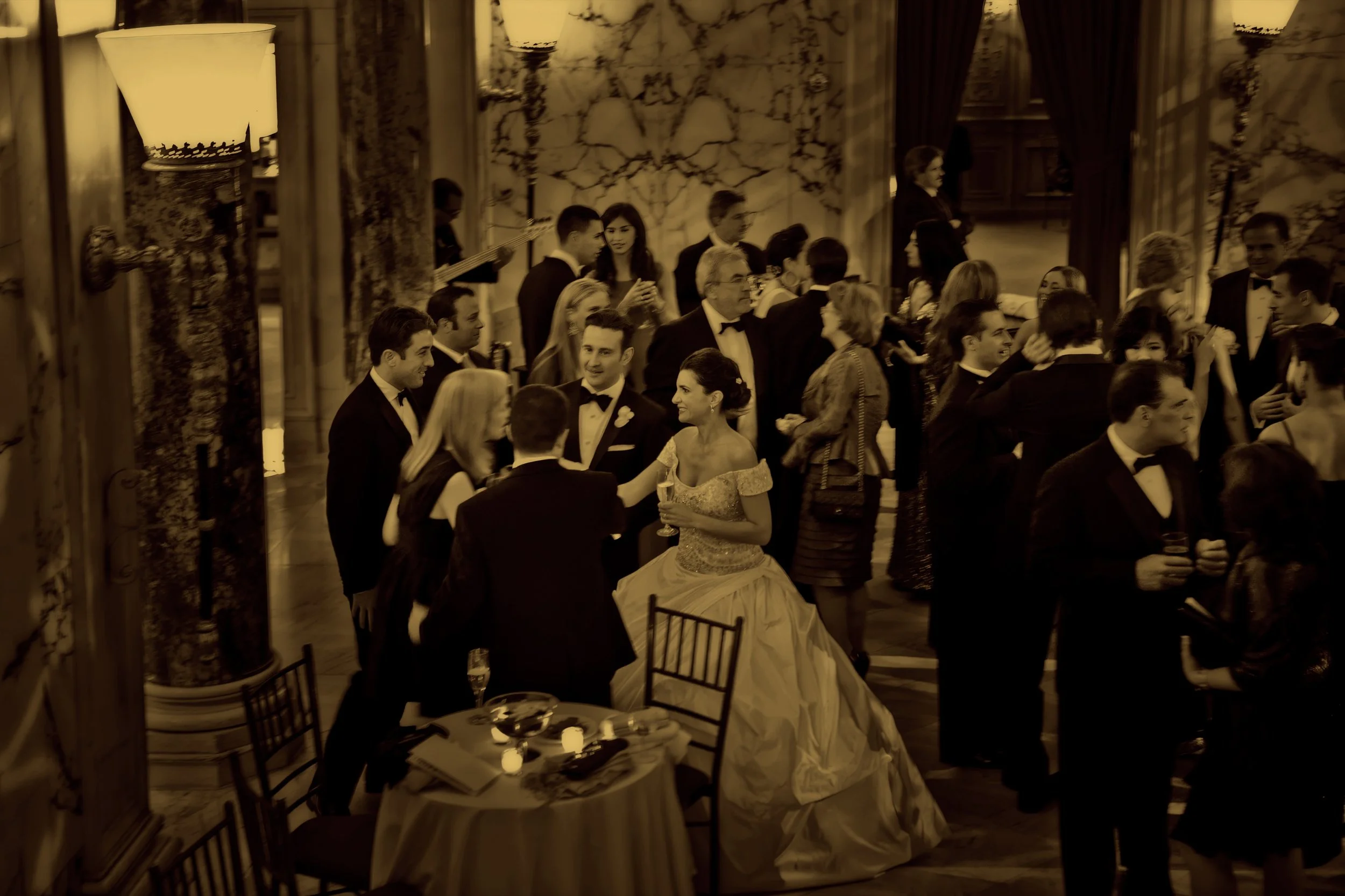 Bride and Groom Greet Guests During Cocktail Hour at Metropolitan Club NYC