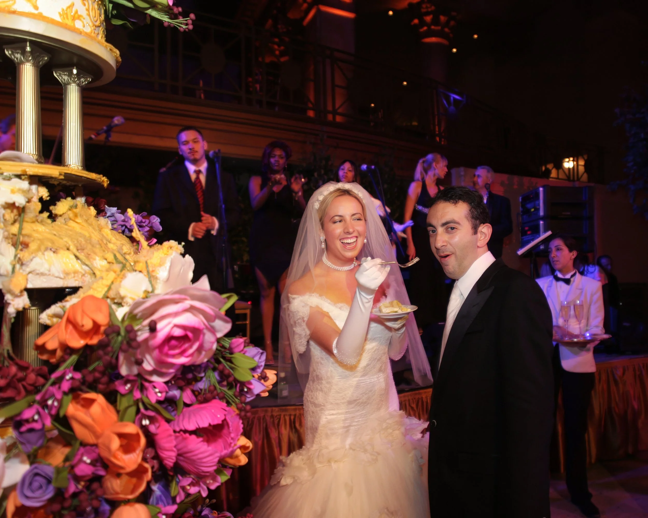 cipriani-wall-street-wedding-cake-cutting-playful.jpg