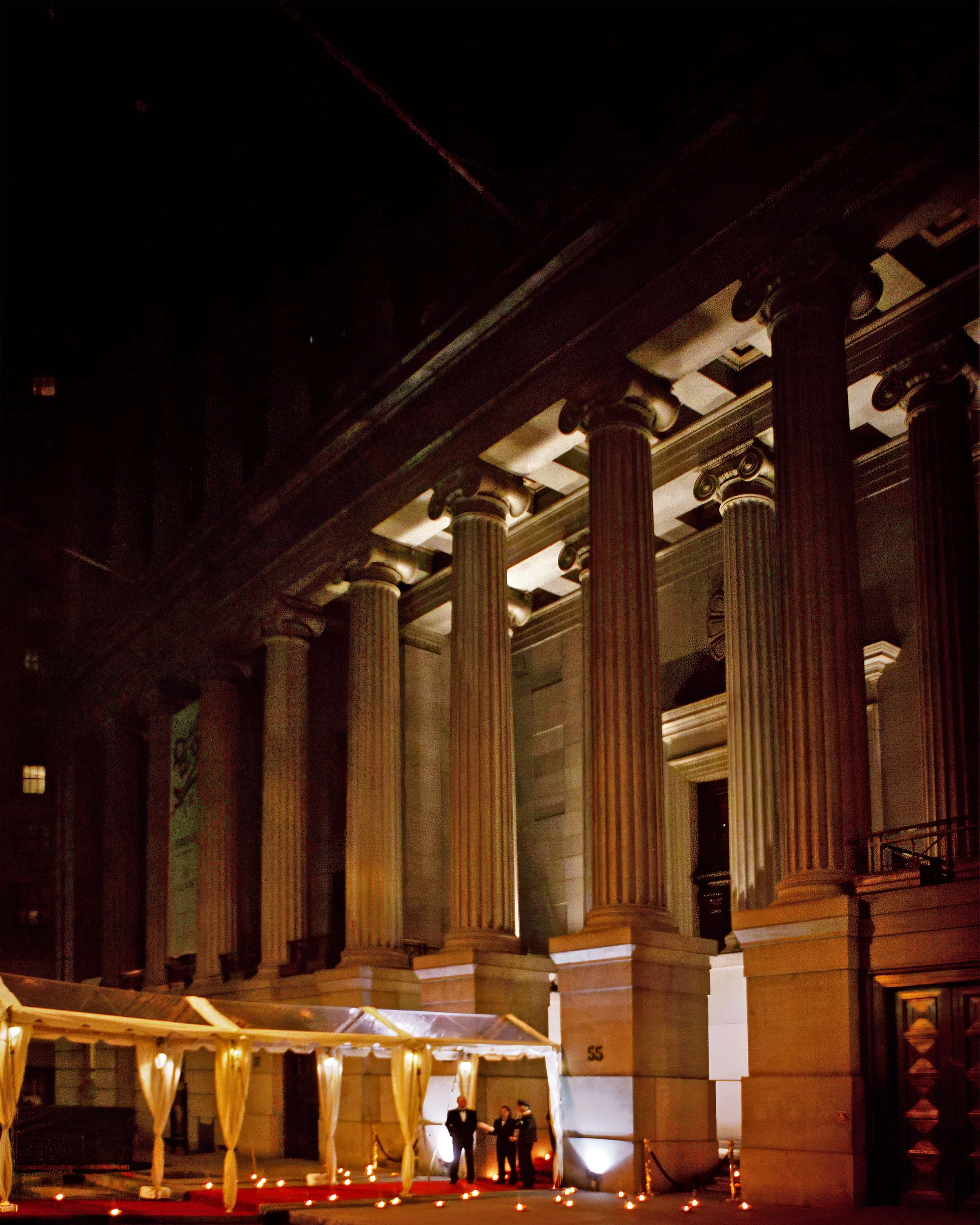 Exterior of Cipriani Wall Street NYC with red carpet entrance for luxury wedding reception.