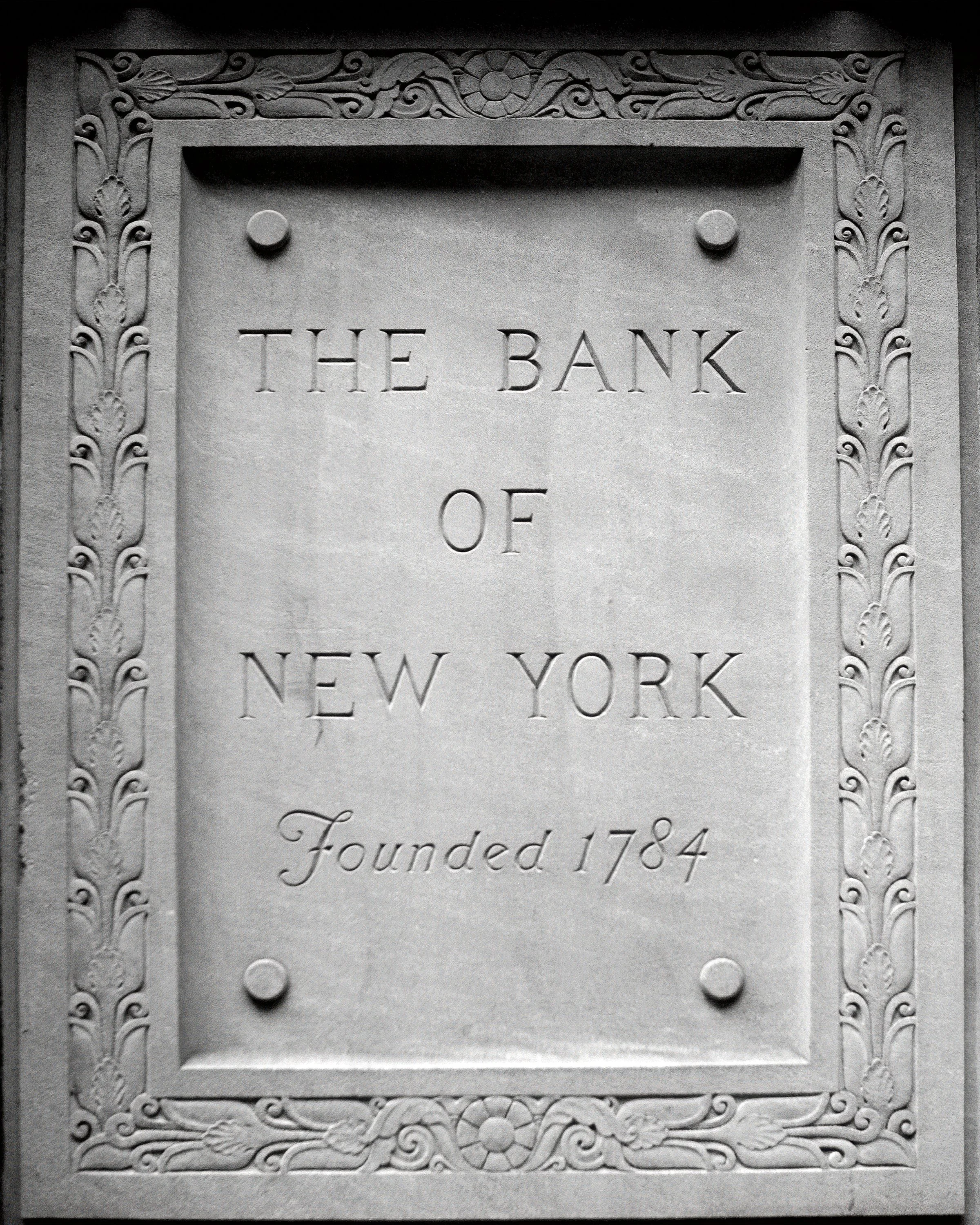 Historic Bank of New York granite sign at 48 Wall Street wedding ceremony entrance NYC.