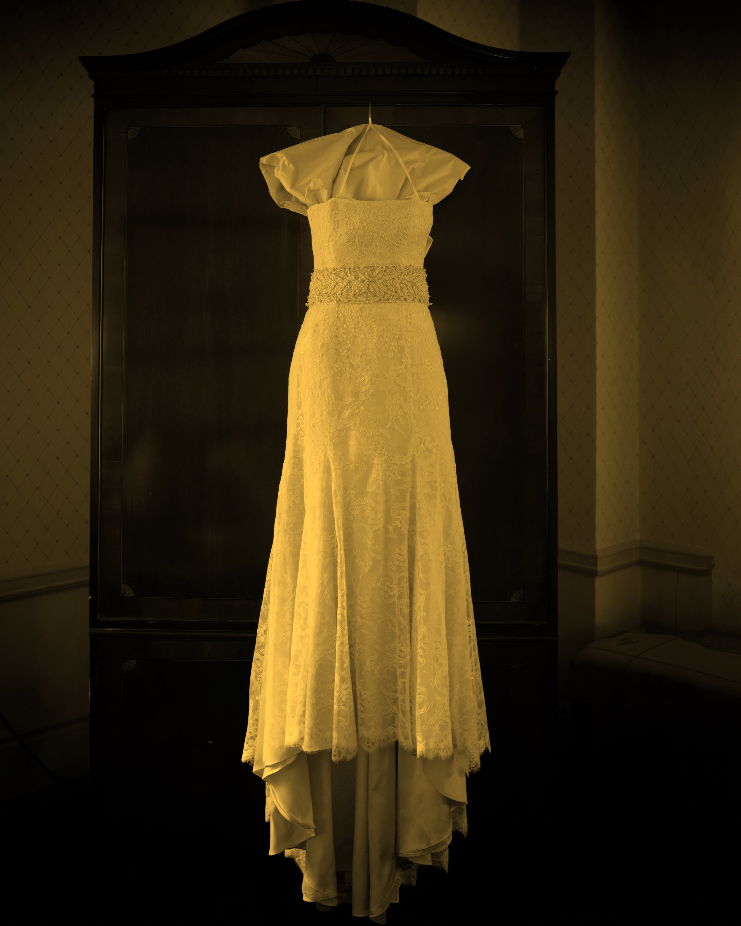 Wedding Dress Hanging in a Yale Club NYC Luxury Suite