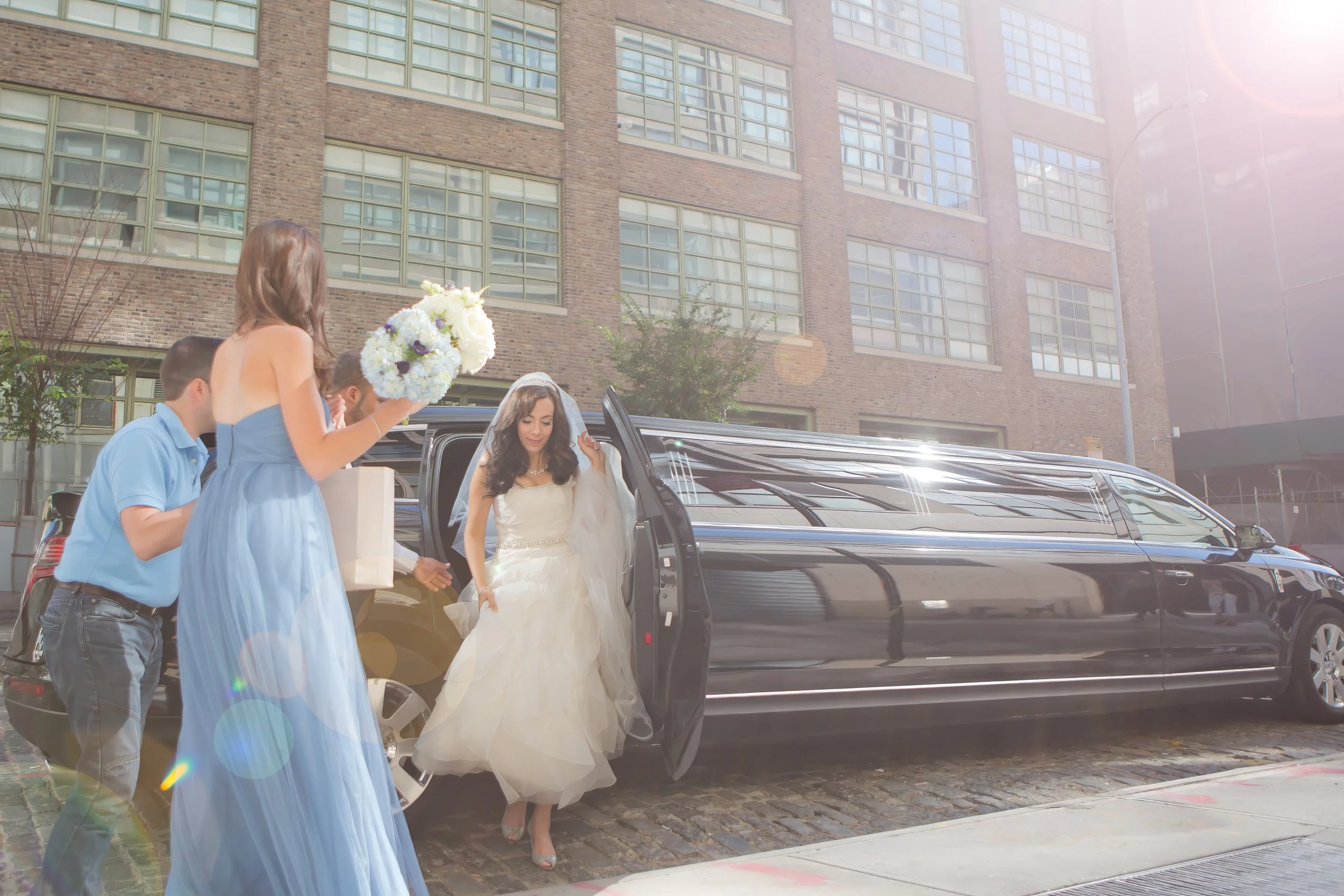 Bride Arrives at Tribeca Rooftop Cobblestone Entrance
