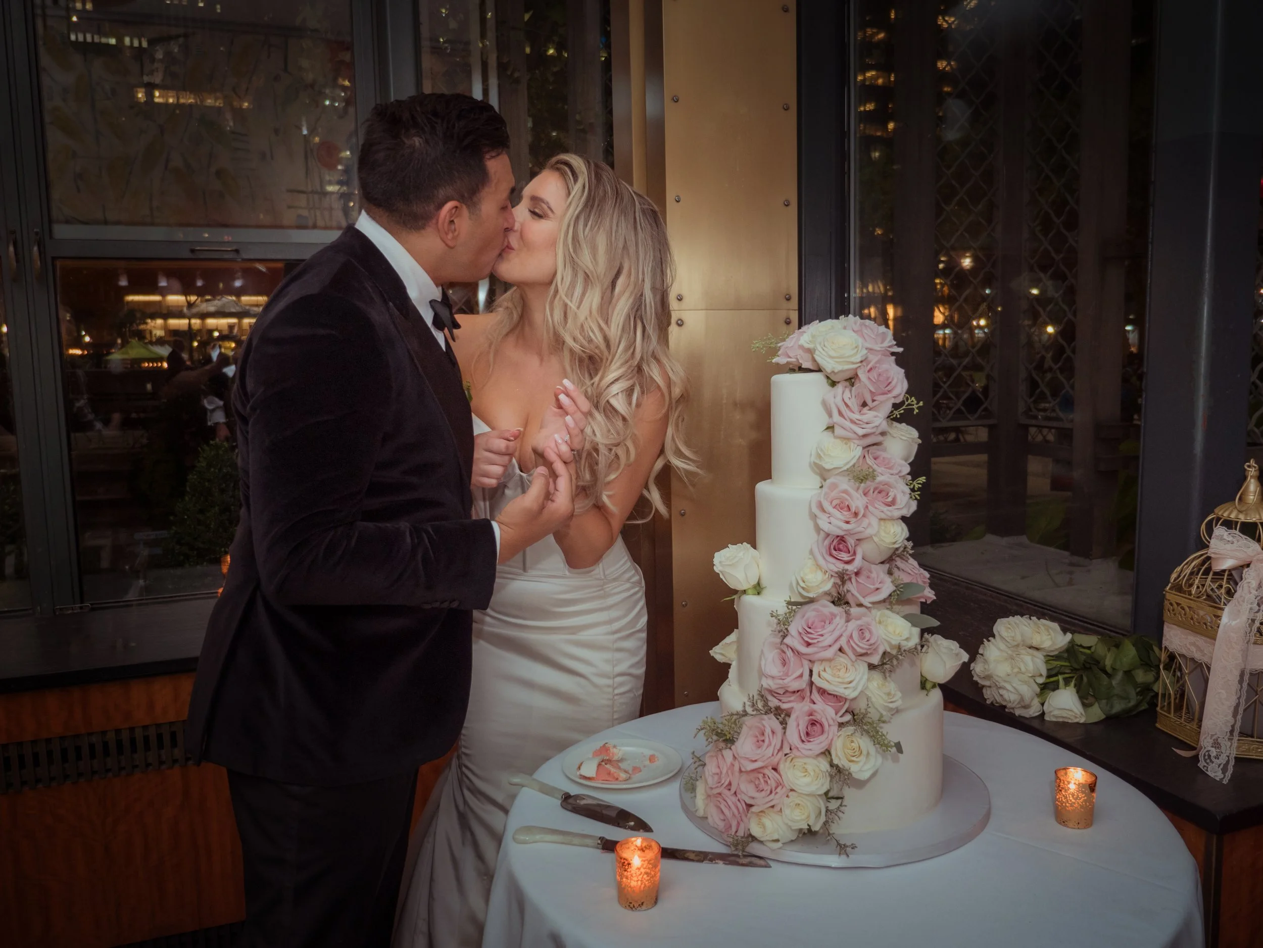 Wedding Cake Cutting Kiss at Bryant Park Grill NYC Reception