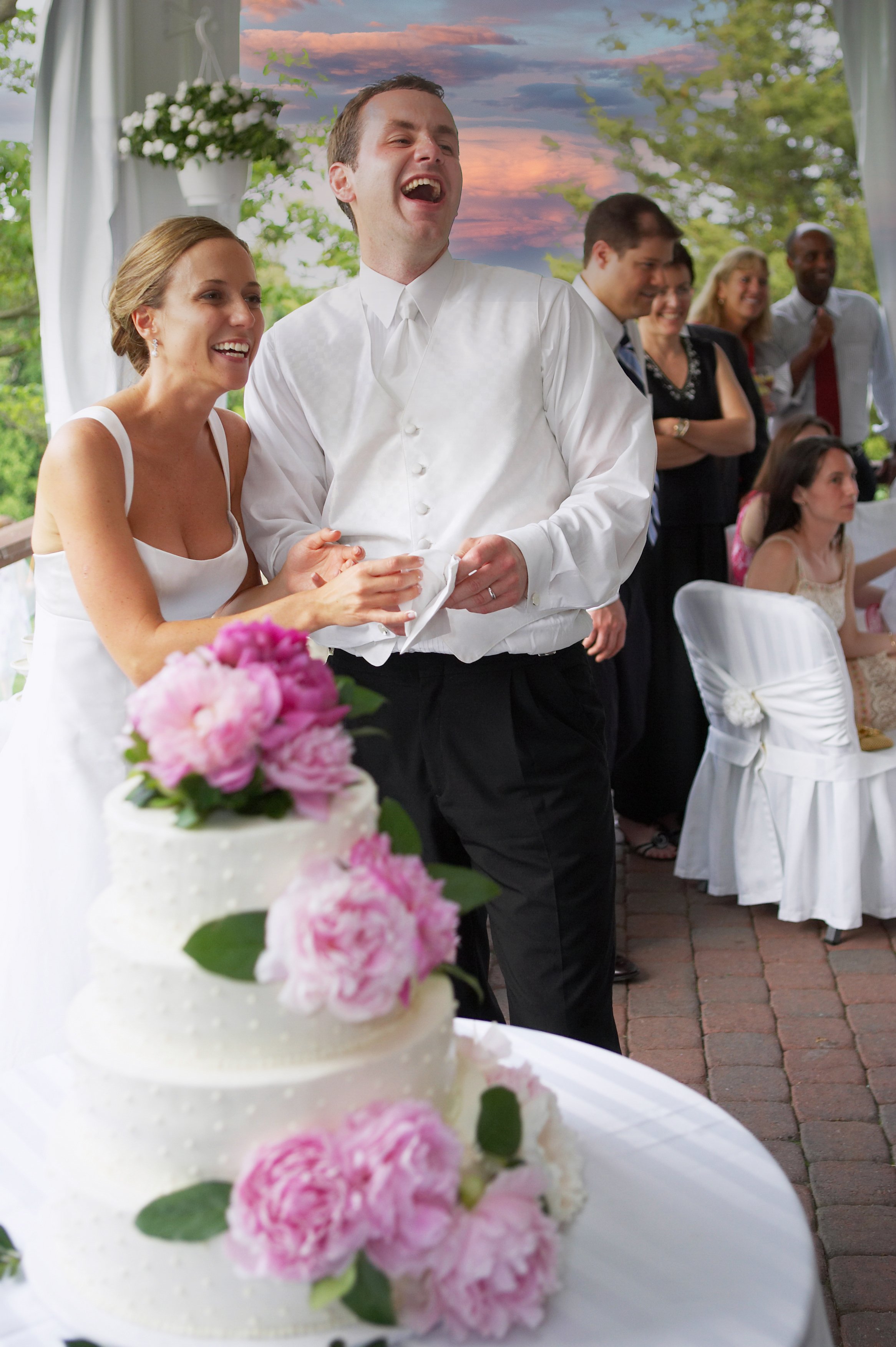 Joyful Cake Cutting at Inn at Mystic Wedding Reception