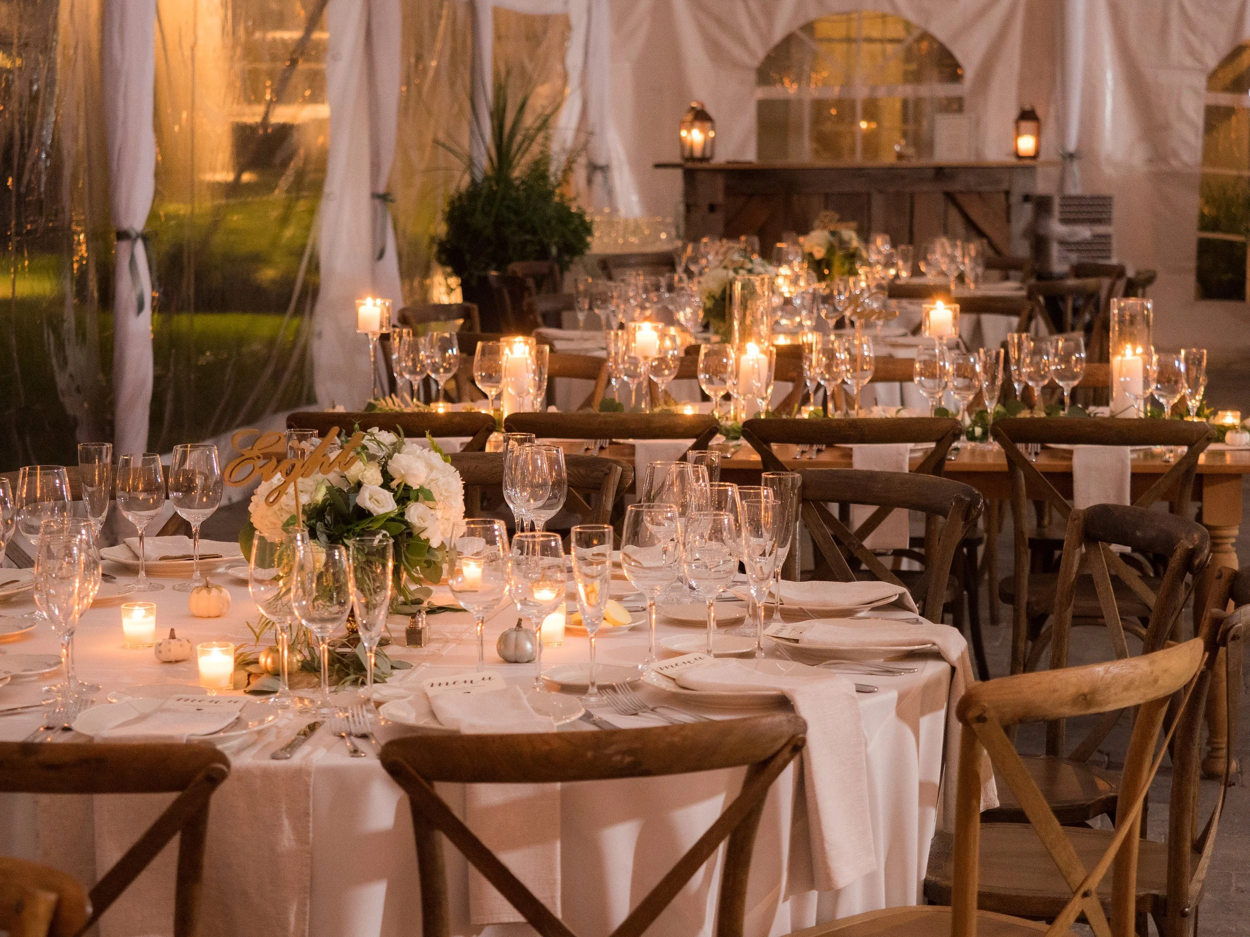 Tented wedding reception setup with tables and decor at Lion Rock Farm awaiting guests